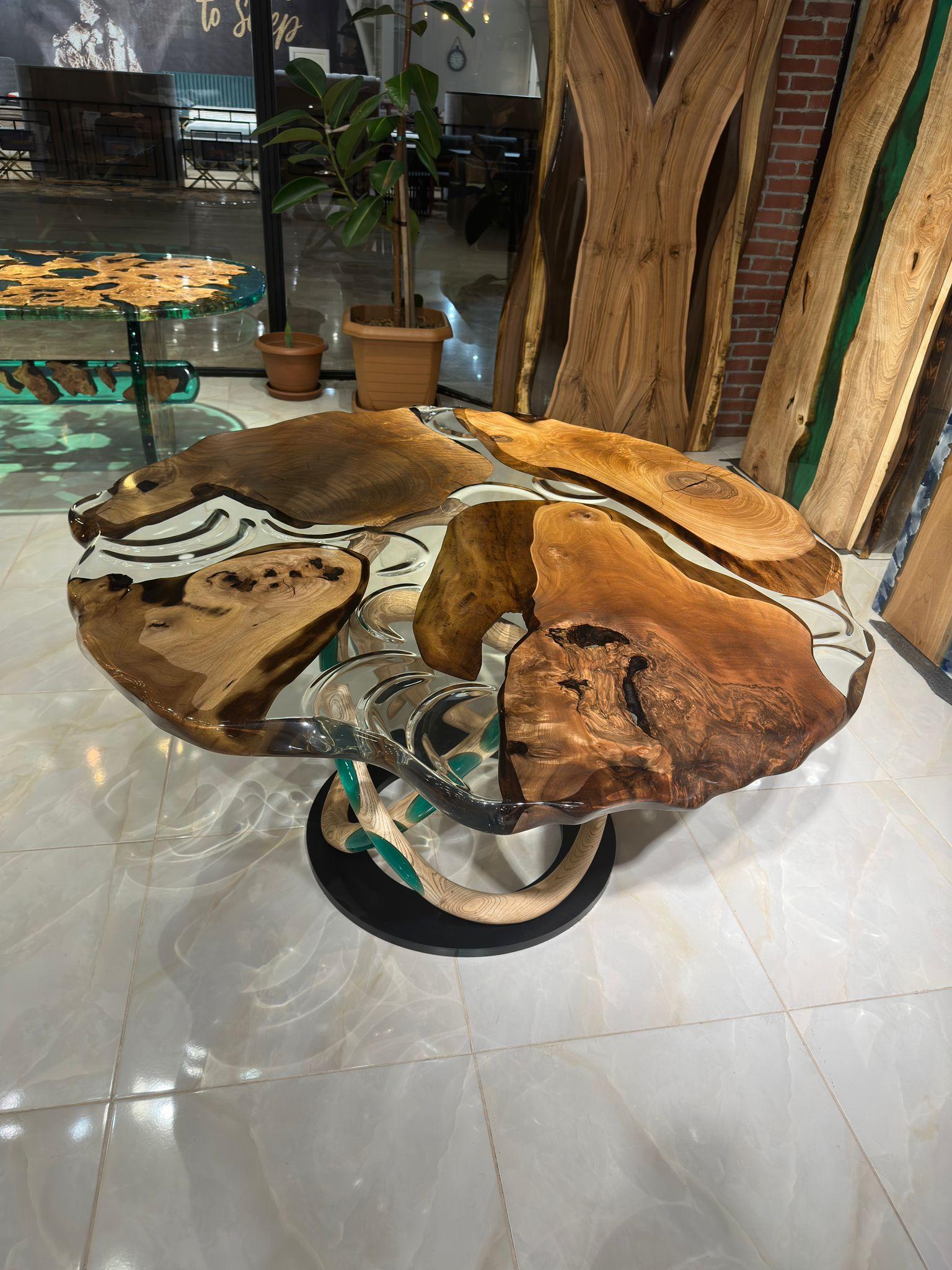 https://a.1stdibscdn.com/custom-clear-epoxy-resin-modern-wooden-dining-table-for-sale-picture-6/f_91932/f_368114621698397799967/WhatsApp_Image_2023_02_06_at_11_16_21_master.jpeg