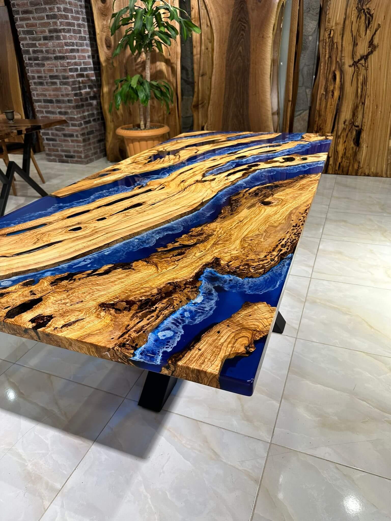 https://a.1stdibscdn.com/custom-order-handmade-live-edge-blue-ocean-epoxy-resin-dining-table-for-sale-picture-3/f_91932/f_367987921698329066072/WhatsApp_Image_2023_05_31_at_11_27_17_1__master.jpeg
