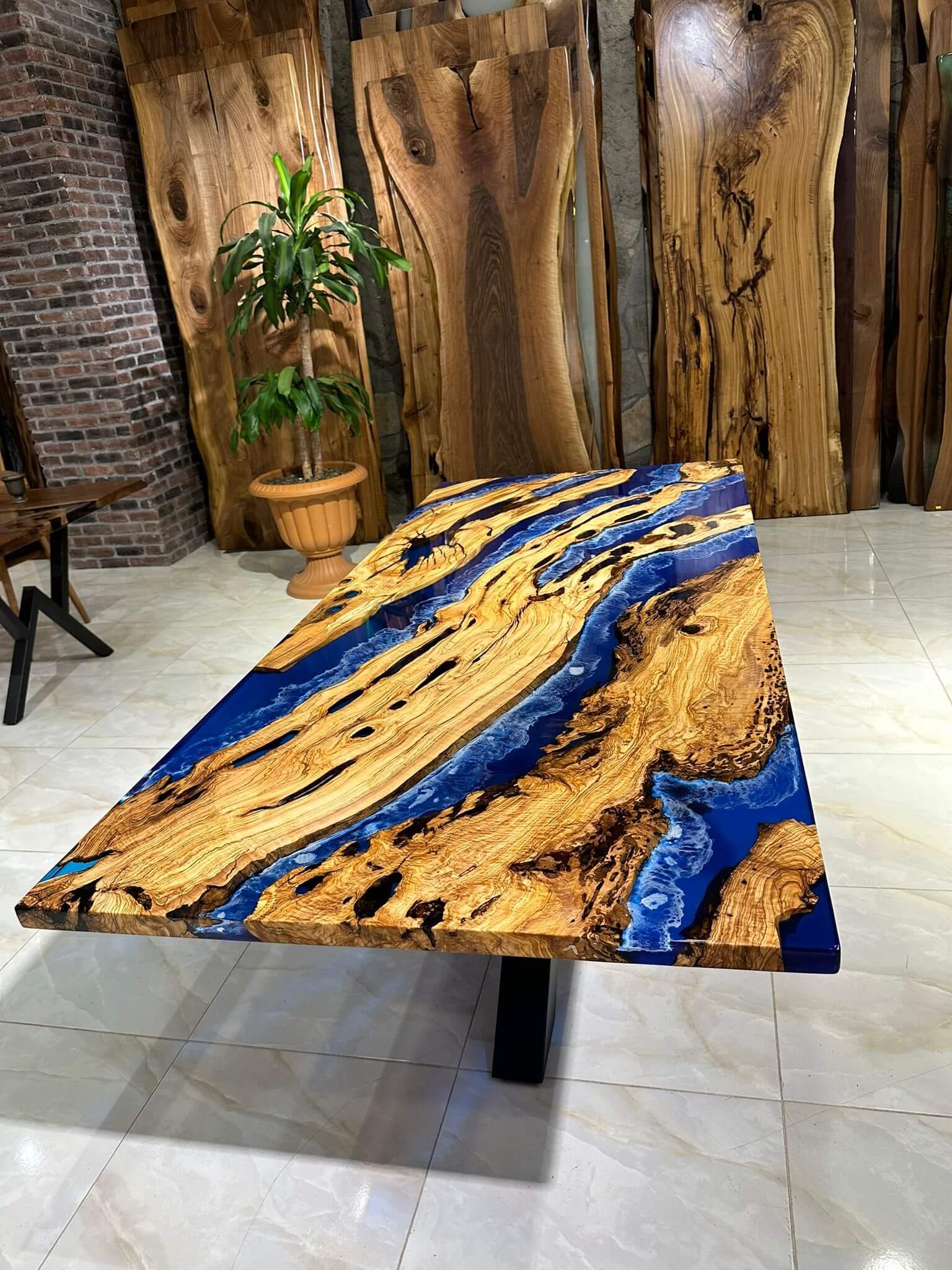 https://a.1stdibscdn.com/custom-order-handmade-live-edge-blue-ocean-epoxy-resin-dining-table-for-sale-picture-4/f_91932/f_367987921698329066328/WhatsApp_Image_2023_05_31_at_11_27_19_1__master.jpeg