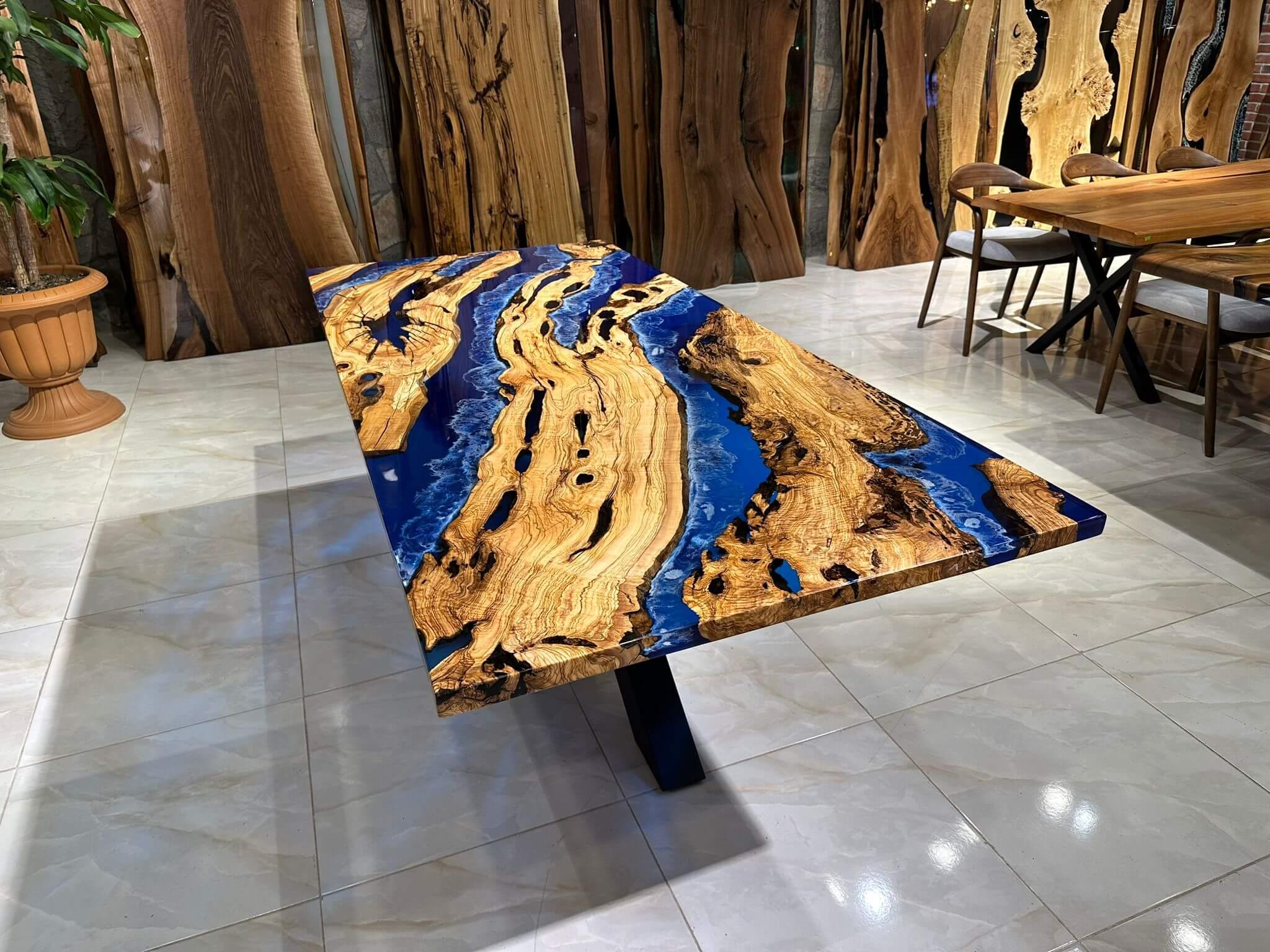 https://a.1stdibscdn.com/custom-order-handmade-live-edge-blue-ocean-epoxy-resin-dining-table-for-sale-picture-5/f_91932/f_367987921698329066247/WhatsApp_Image_2023_05_31_at_11_27_21_1__master.jpeg