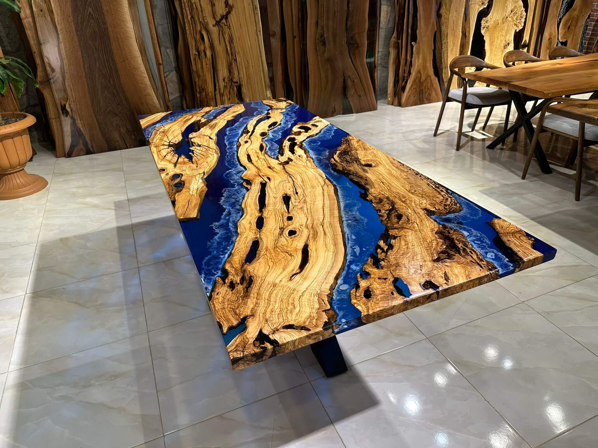 https://a.1stdibscdn.com/custom-order-handmade-live-edge-blue-ocean-epoxy-resin-dining-table-for-sale-picture-8/f_91932/f_367987921698329066254/WhatsApp_Image_2023_05_31_at_11_27_27_2__master.jpeg