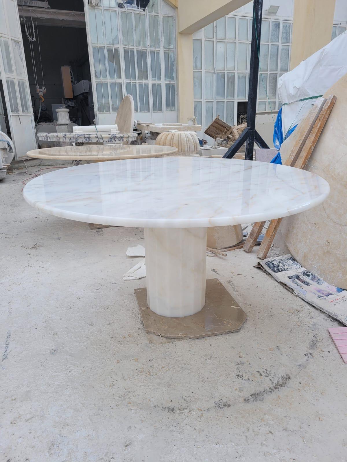 https://a.1stdibscdn.com/white-marble-round-dining-table-with-hexagon-base-for-sale-picture-2/f_80522/f_388914521710760787876/WhatsApp_Image_2024_03_06_at_21_15_10_master.jpeg