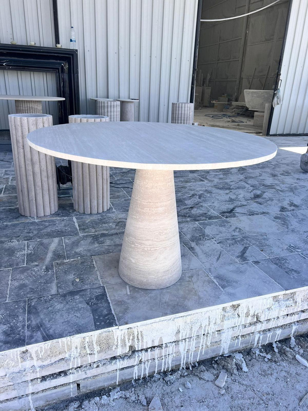 https://a.1stdibscdn.com/round-travertine-dining-table-white-marble-round-table-round-marble-table-for-sale-picture-4/f_91932/f_422252921731069181777/WhatsApp_Image_2024_11_08_at_15_31_58_master.jpeg