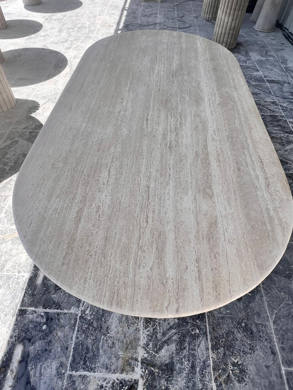 https://a.1stdibscdn.com/oval-travertine-dining-table-marble-table-natural-stone-kitchen-table-for-sale-picture-4/f_91932/f_422578721731318117113/WhatsApp_Image_2024_11_11_at_12_40_41_2__master.jpeg