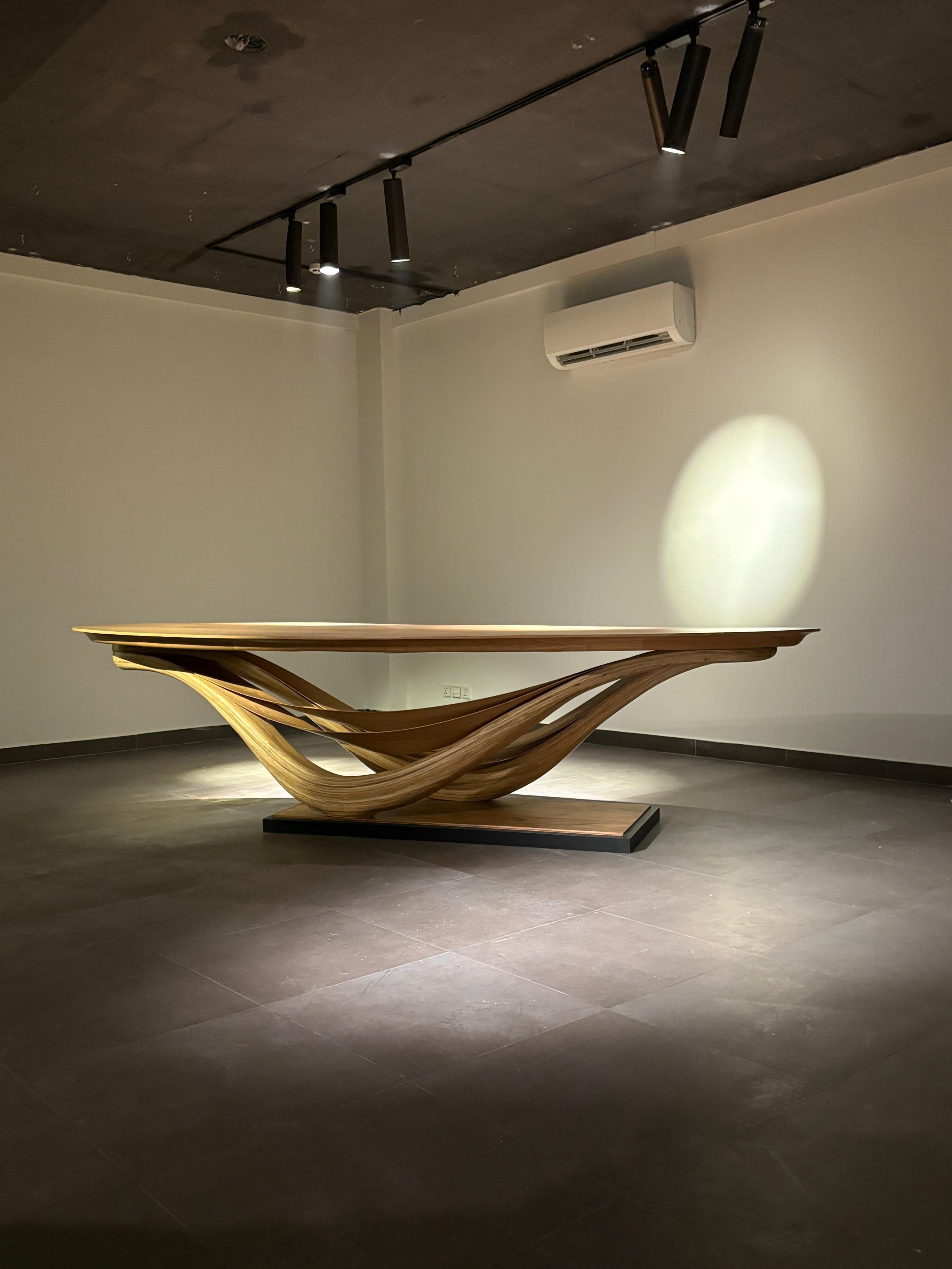 https://a.1stdibscdn.com/dining-table-no-3-fluentum-series-bent-red-oak-wood-by-raka-studio-for-sale-picture-4/f_54112/f_434239121738348796718/WhatsApp_Image_2025_01_22_at_9_13_15_PM_master.jpeg