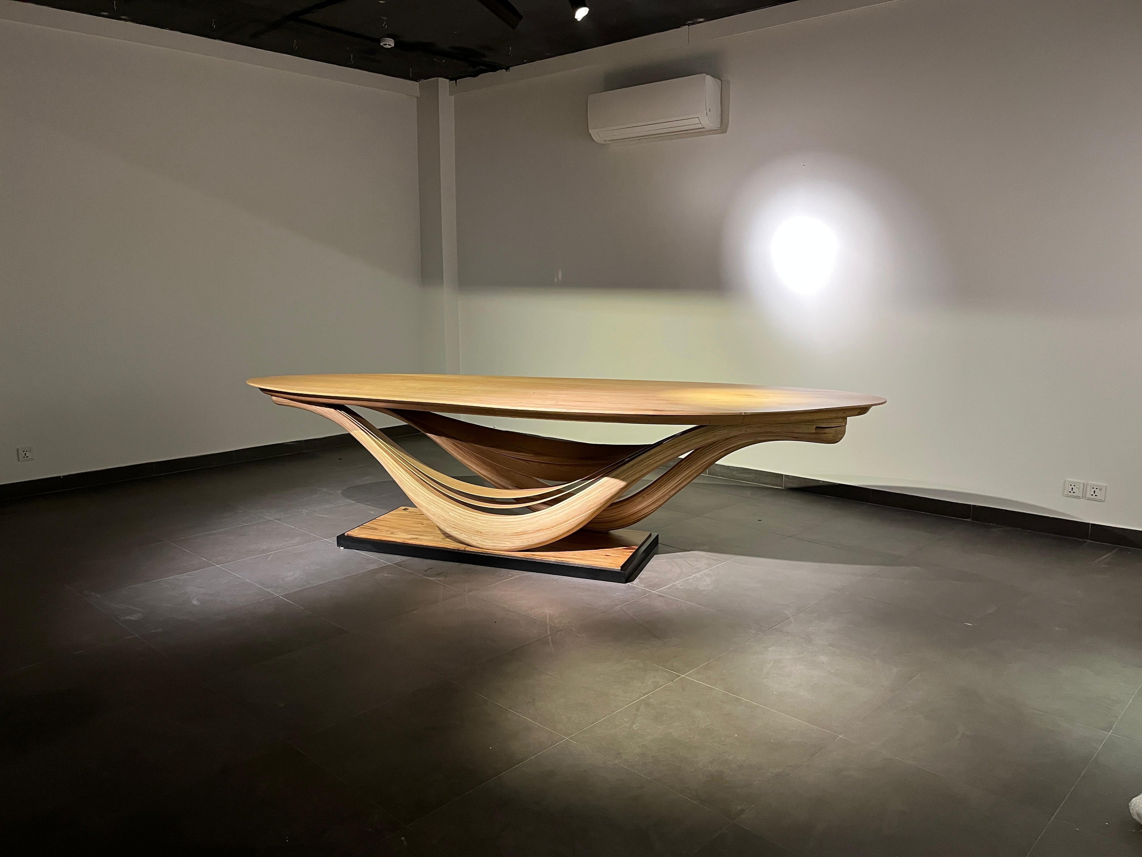https://a.1stdibscdn.com/dining-table-no-3-fluentum-series-bent-red-oak-wood-by-raka-studio-for-sale-picture-9/f_54112/f_434239121738348796643/WhatsApp_Image_2025_01_31_at_10_35_30_PM_master.jpeg