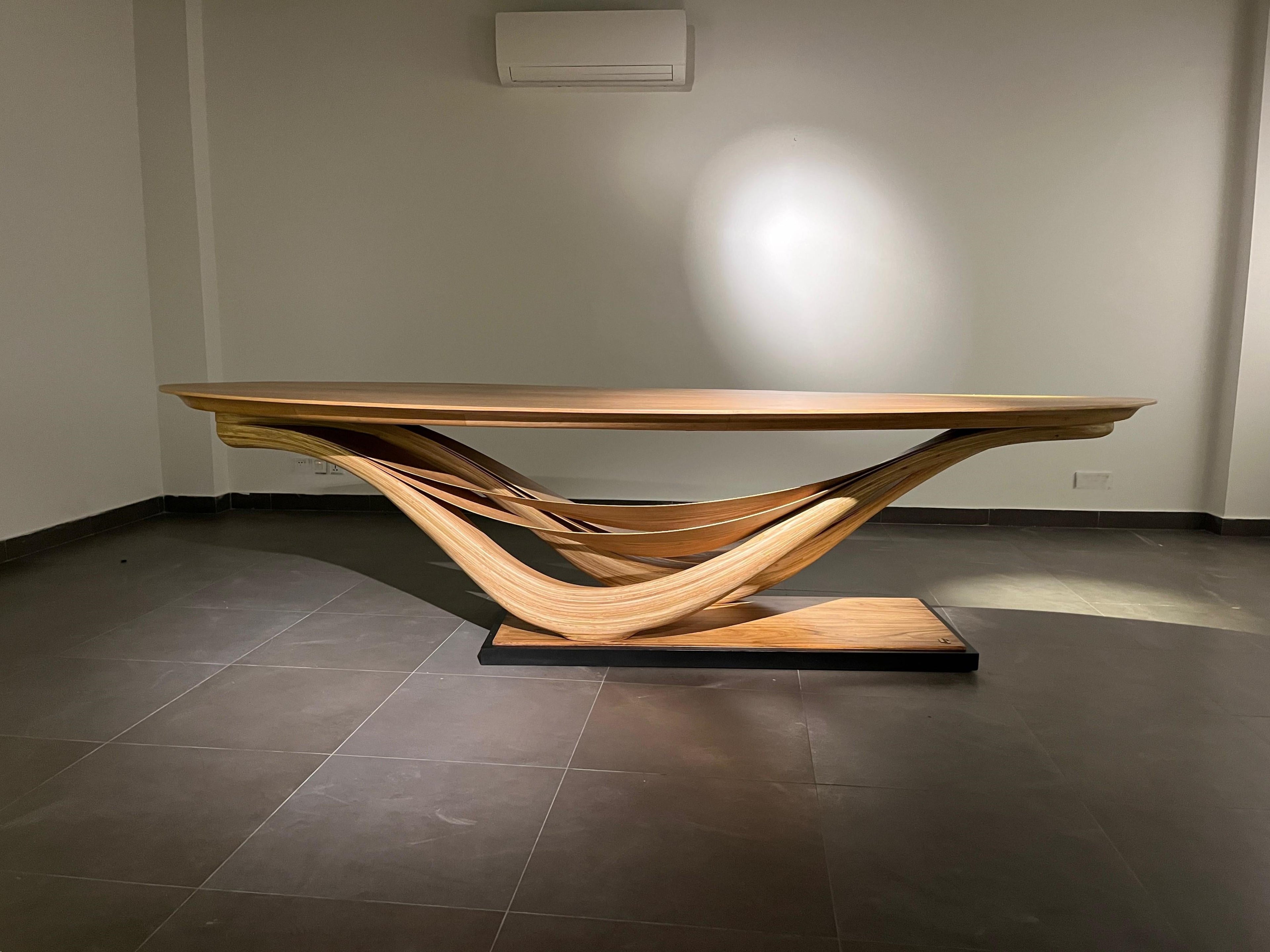 https://a.1stdibscdn.com/dining-table-no-3-fluentum-series-bent-red-oak-wood-by-raka-studio-for-sale-picture-10/f_54112/f_434239121738348835240/WhatsApp_Image_2025_01_31_at_10_44_13_PM_master.jpeg