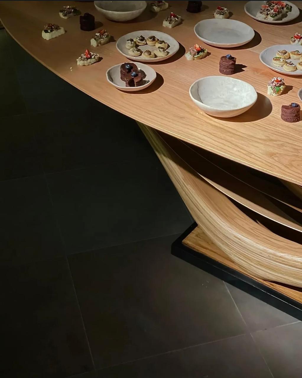 https://a.1stdibscdn.com/dining-table-no-3-fluentum-series-bent-red-oak-wood-by-raka-studio-for-sale-picture-8/f_54112/f_434239121738348834139/WhatsApp_Image_2025_01_31_at_11_32_00_PM_master.jpeg