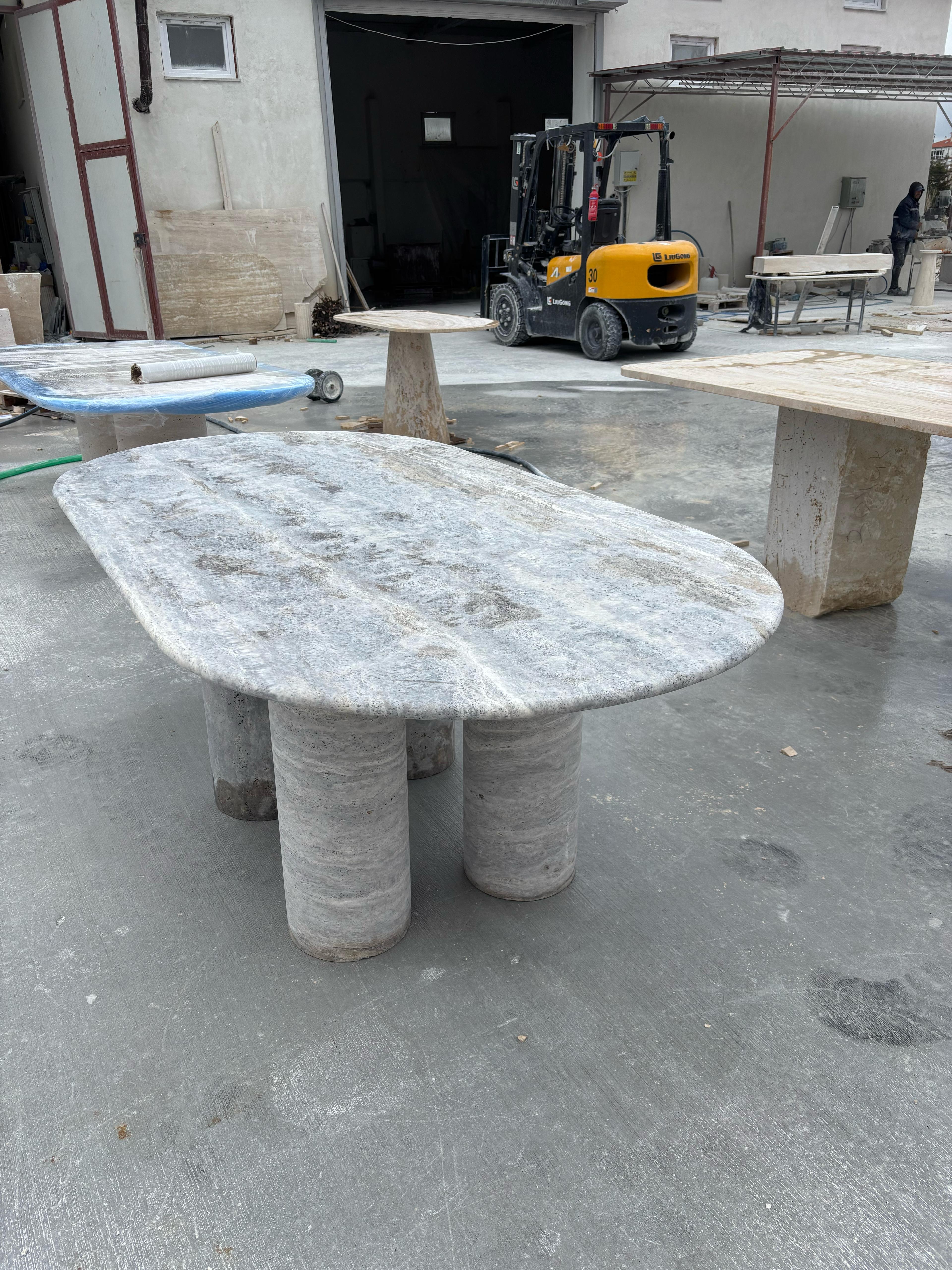 https://a.1stdibscdn.com/french-silver-travertine-dining-table-modern-marble-stone-office-table-for-sale-picture-6/f_91932/f_444984621744541418709/WhatsApp_Image_2025_03_24_at_14_43_52_master.jpeg