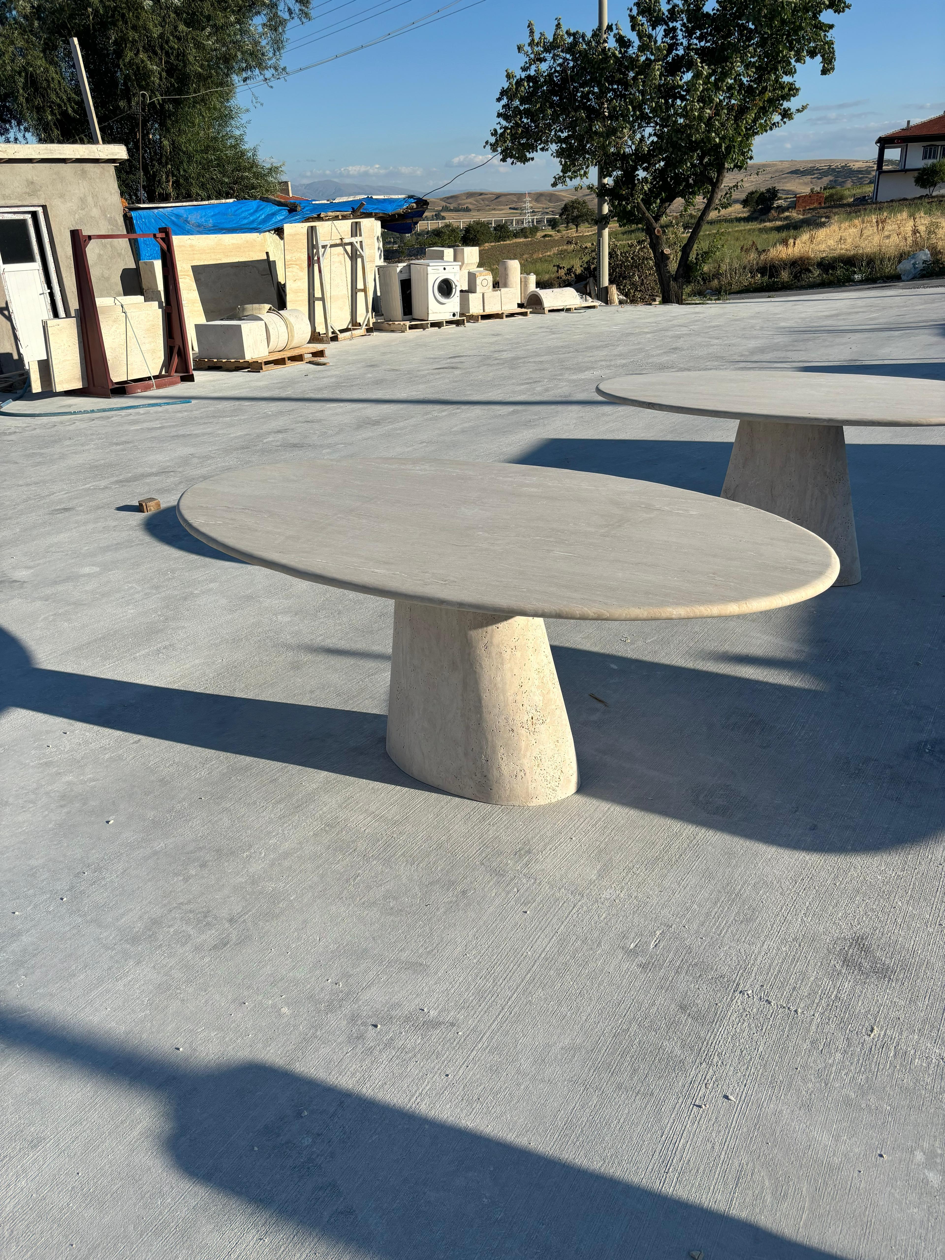 https://a.1stdibscdn.com/modern-ellips-italian-travertine-dining-table-natural-marble-kitchen-table-for-sale-picture-5/f_91932/f_453973721749559272209/WhatsApp_Image_2025_05_07_at_14_22_12_master.jpeg