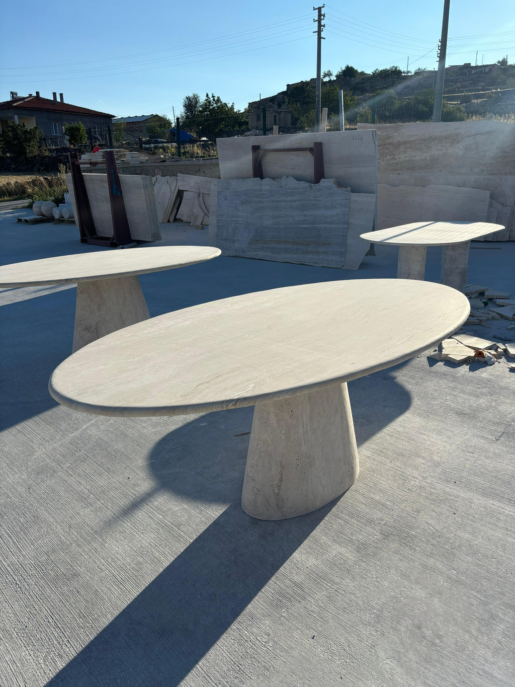 https://a.1stdibscdn.com/modern-ellips-italian-travertine-dining-table-natural-marble-kitchen-table-for-sale-picture-3/f_91932/f_453973721749559269569/WhatsApp_Image_2025_05_07_at_14_23_23_1__master.jpeg