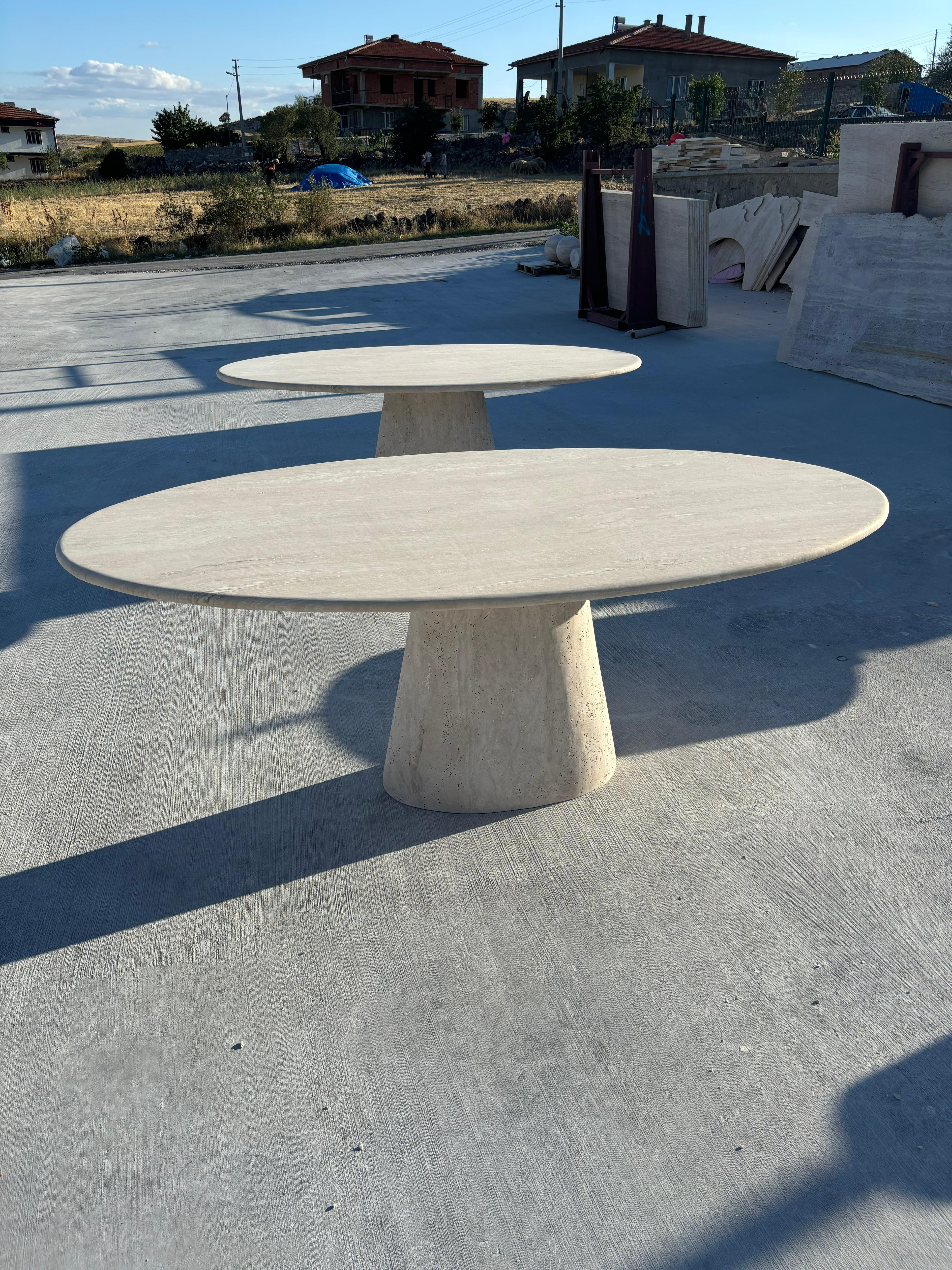 https://a.1stdibscdn.com/modern-ellips-italian-travertine-dining-table-natural-marble-kitchen-table-for-sale-picture-2/f_91932/f_453973721749559270421/WhatsApp_Image_2025_05_07_at_14_23_23_master.jpeg