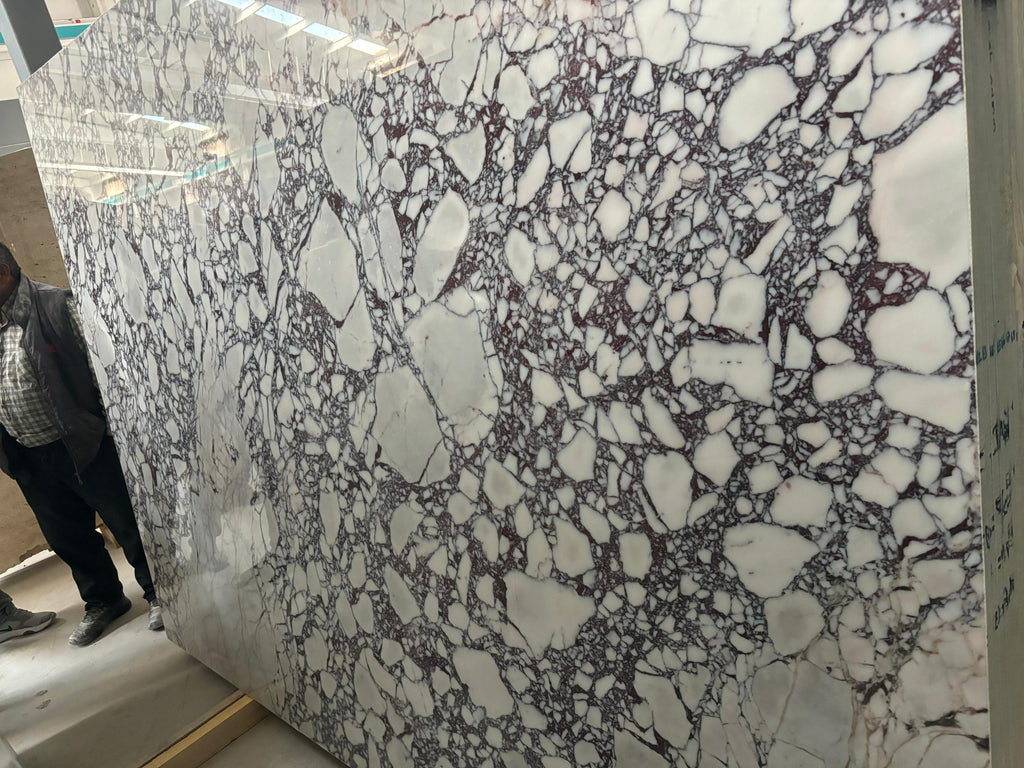 https://a.1stdibscdn.com/italian-calacatta-viola-stone-marble-handmade-living-room-coffee-table-for-sale-picture-3/f_91932/f_454243821749733435080/WhatsApp_Image_2025_05_16_at_17_42_07_3__master.jpeg