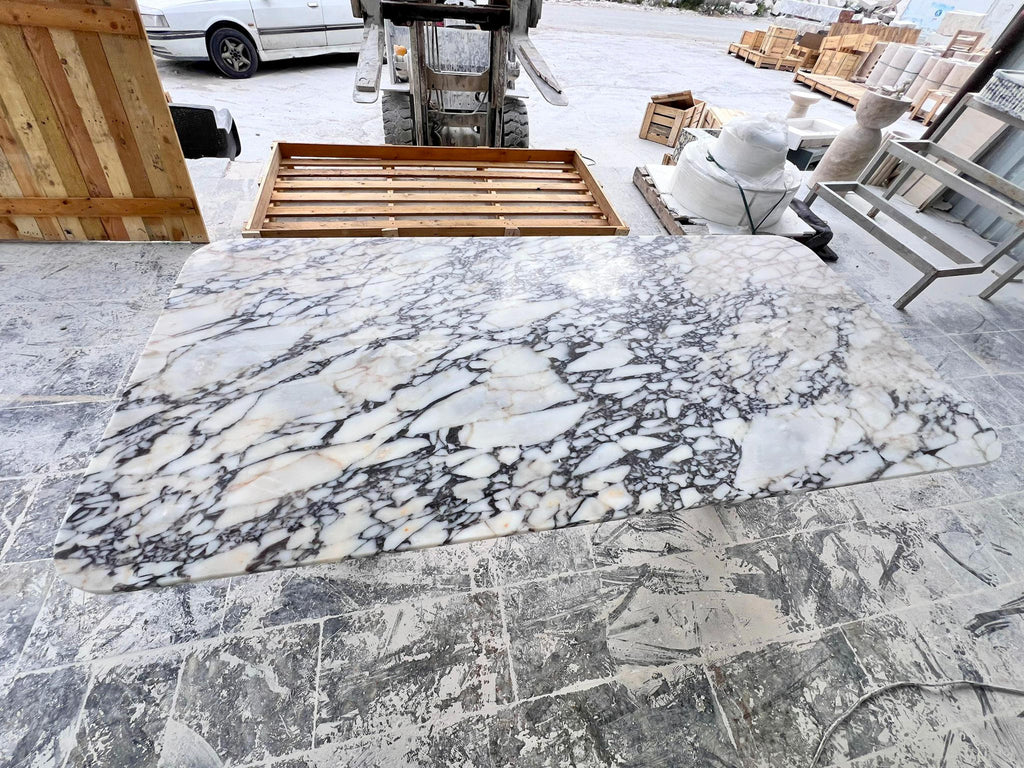 https://a.1stdibscdn.com/custom-calacatta-viola-oval-dining-table-calacatta-marble-custom-table-for-sale-picture-6/f_91932/f_457684221751905837102/WhatsApp_Image_2025_05_27_at_13_17_50_3__master.jpeg