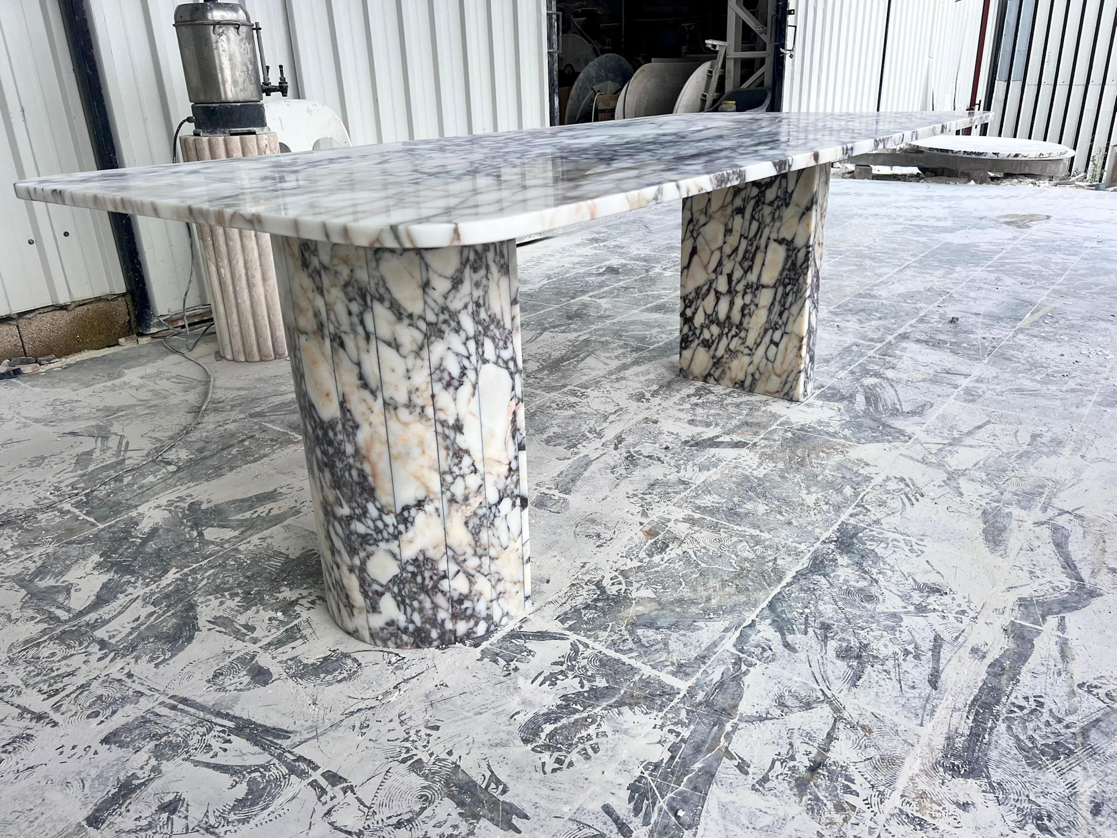 https://a.1stdibscdn.com/custom-calacatta-viola-oval-dining-table-calacatta-marble-custom-table-for-sale-picture-8/f_91932/f_457684221751905838997/WhatsApp_Image_2025_05_27_at_13_17_50_master.jpeg