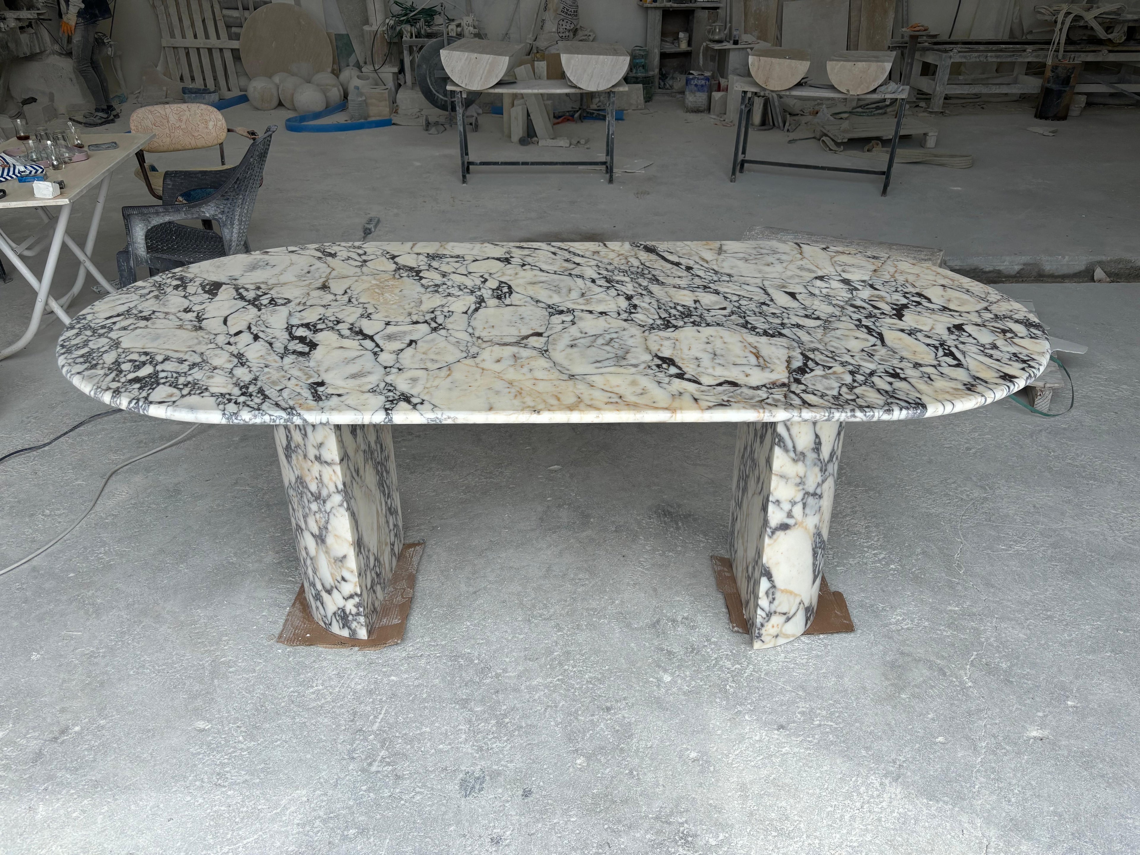 https://a.1stdibscdn.com/modern-oval-calacatta-viola-dining-table-handmade-natural-stone-kitchen-table-for-sale-picture-4/f_91932/f_451999121748352223793/WhatsApp_Image_2025_05_27_at_15_42_28_master.jpeg