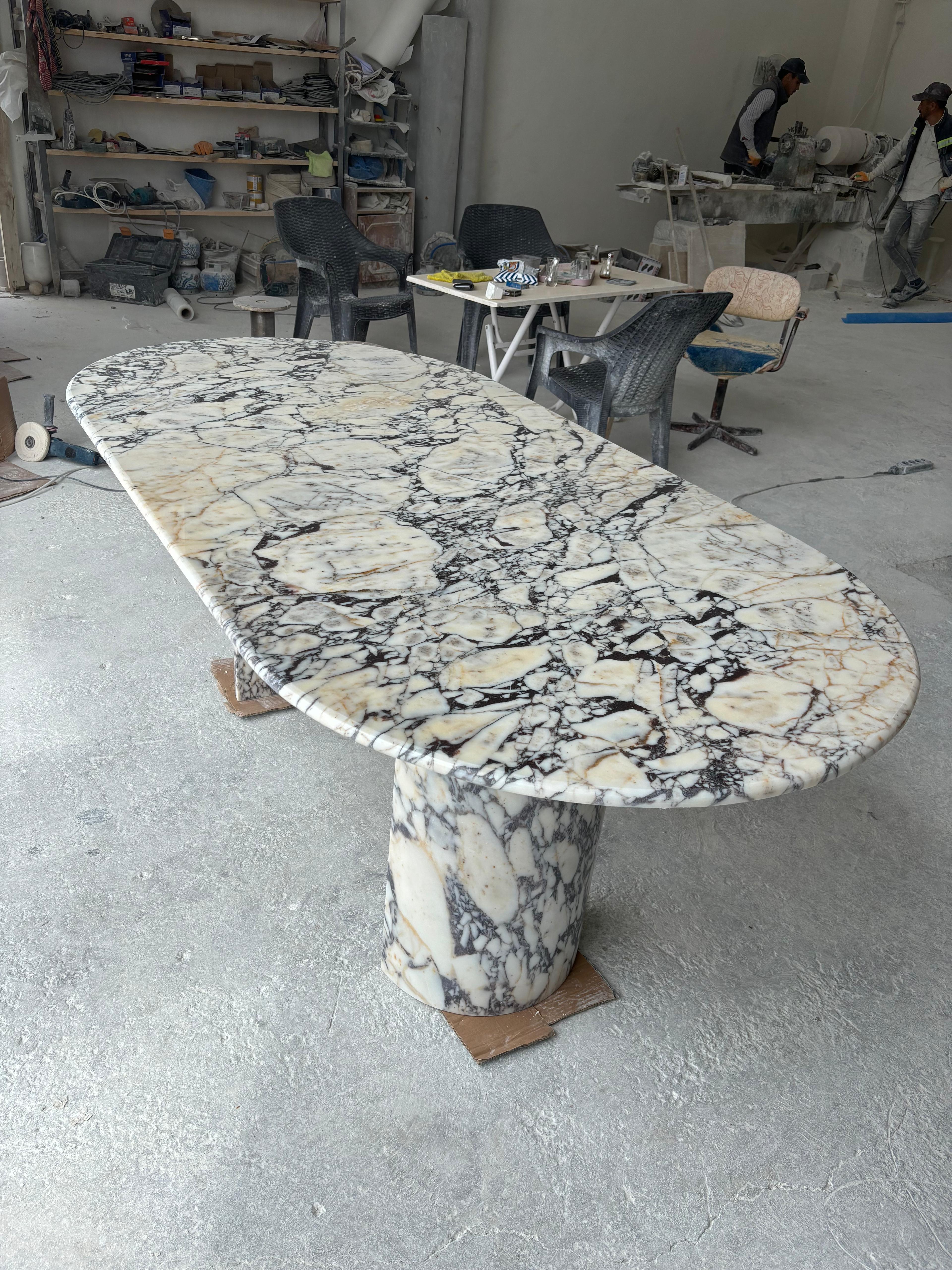 https://a.1stdibscdn.com/modern-oval-calacatta-viola-dining-table-handmade-natural-stone-kitchen-table-for-sale-picture-2/f_91932/f_451999121748352222785/WhatsApp_Image_2025_05_27_at_15_42_29_1__master.jpeg