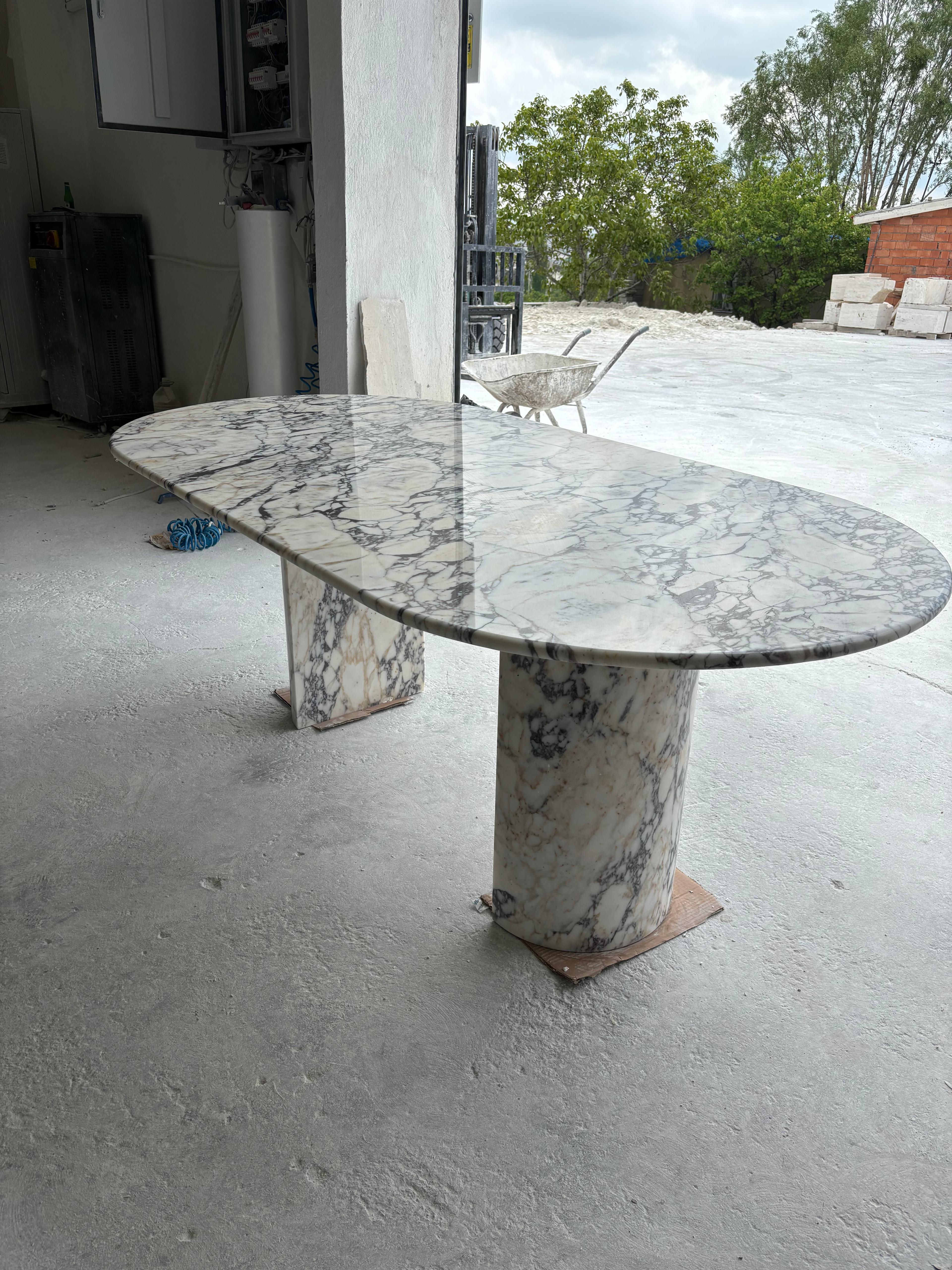 https://a.1stdibscdn.com/modern-oval-calacatta-viola-dining-table-handmade-natural-stone-kitchen-table-for-sale-picture-3/f_91932/f_451999121748352223764/WhatsApp_Image_2025_05_27_at_15_42_29_master.jpeg