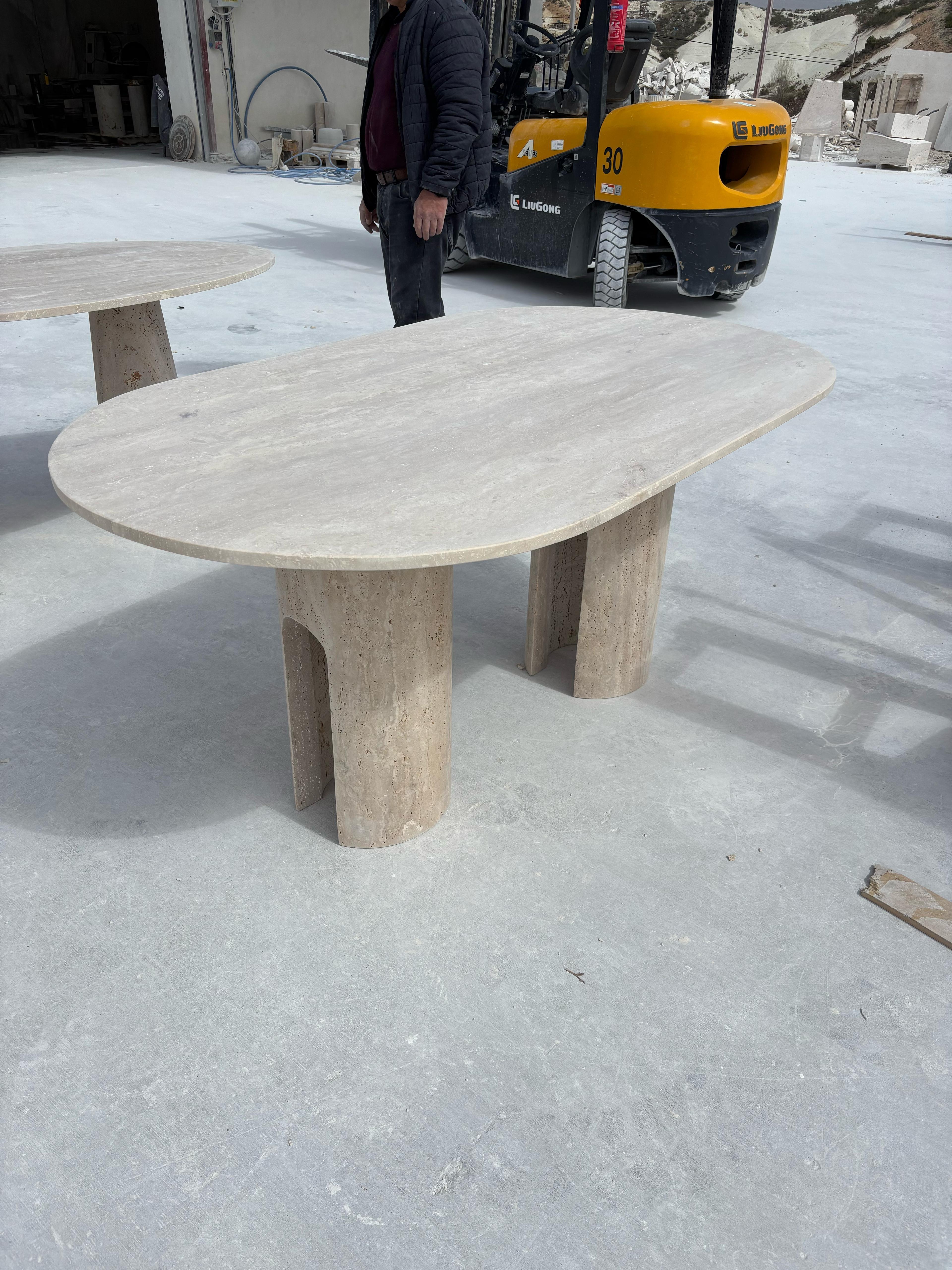 https://a.1stdibscdn.com/italian-travertine-sculptural-handmade-dining-table-custom-travertine-table-for-sale-picture-3/f_91932/f_461773321754578409525/WhatsApp_Image_2025_08_07_at_17_50_39_5__master.jpeg