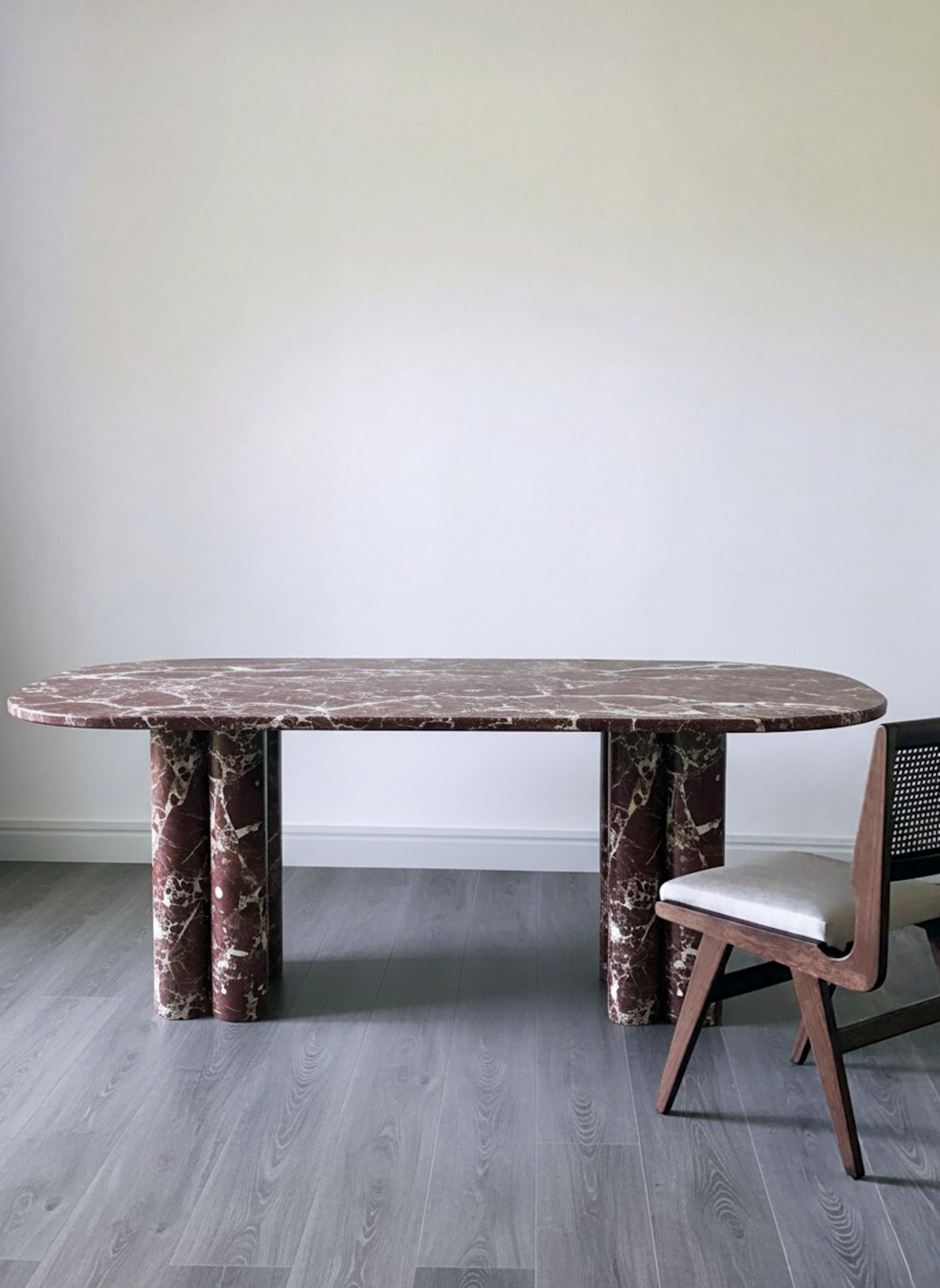 https://a.1stdibscdn.com/sculptural-rosso-levanto-dining-table-red-marble-dining-table-for-sale-picture-2/f_91932/f_470847421760704141638/WhatsApp_Image_2025_09_01_at_11_04_50_3__master.jpeg