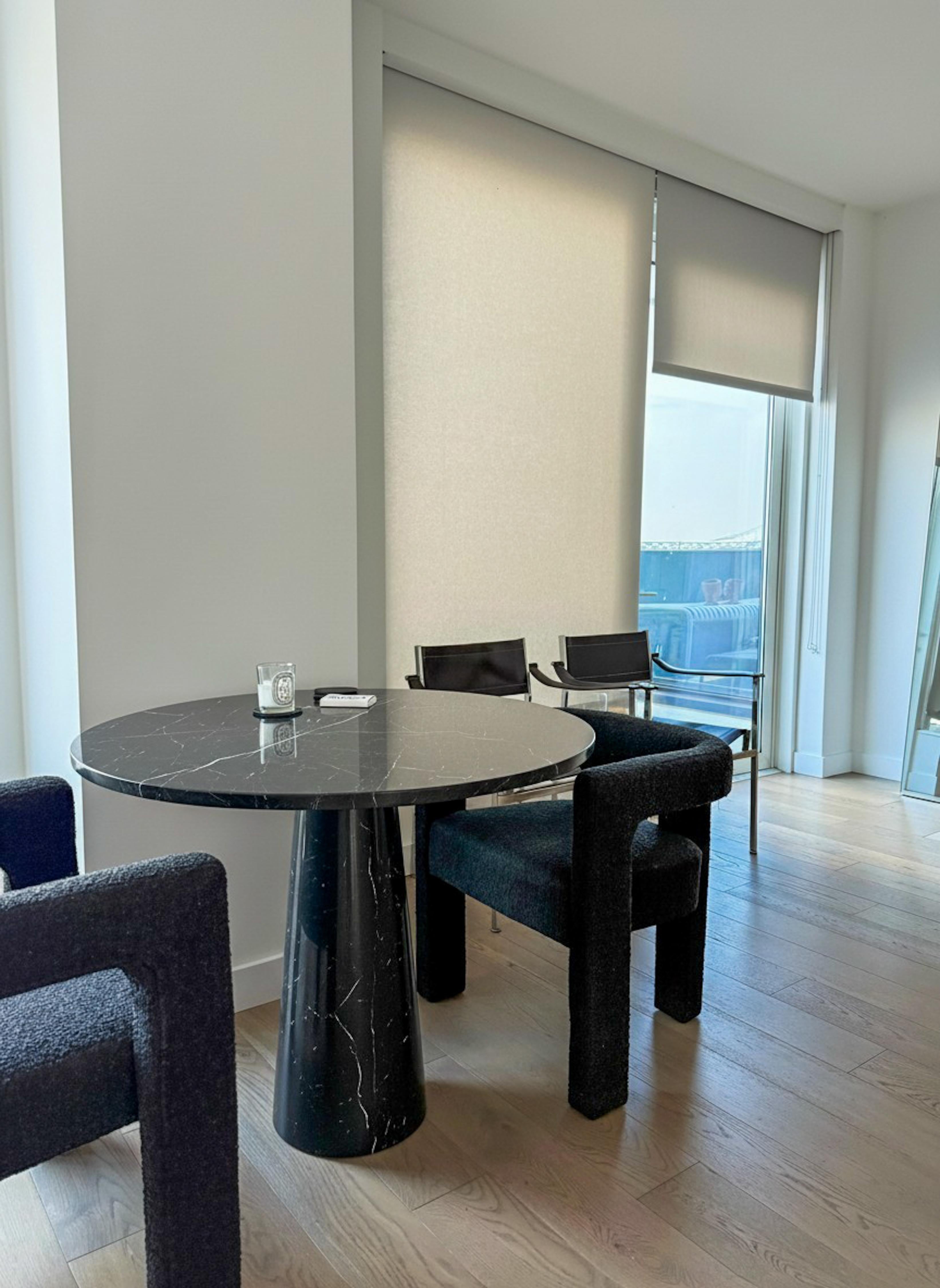 https://a.1stdibscdn.com/alexander-black-round-table-fully-black-marble-dining-round-table-for-sale-picture-2/f_91932/f_464840821756718509037/WhatsApp_Image_2025_09_01_at_12_12_38_master.jpeg