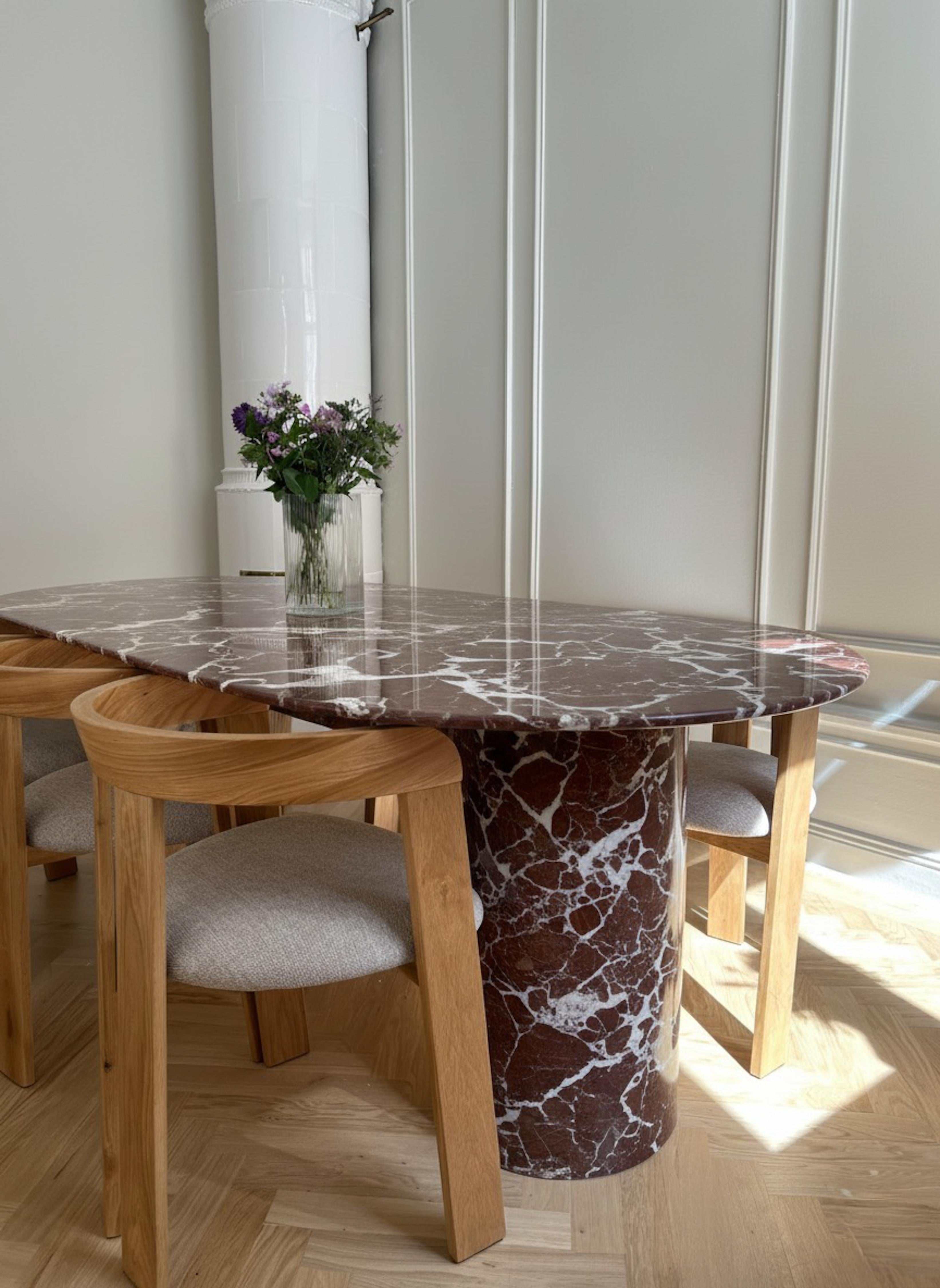 https://a.1stdibscdn.com/rosso-levanto-oval-marble-dining-table-red-marble-oval-kitchen-table-for-sale-picture-4/f_91932/f_464849721756722643461/WhatsApp_Image_2025_09_01_at_13_11_03_1__master.jpeg