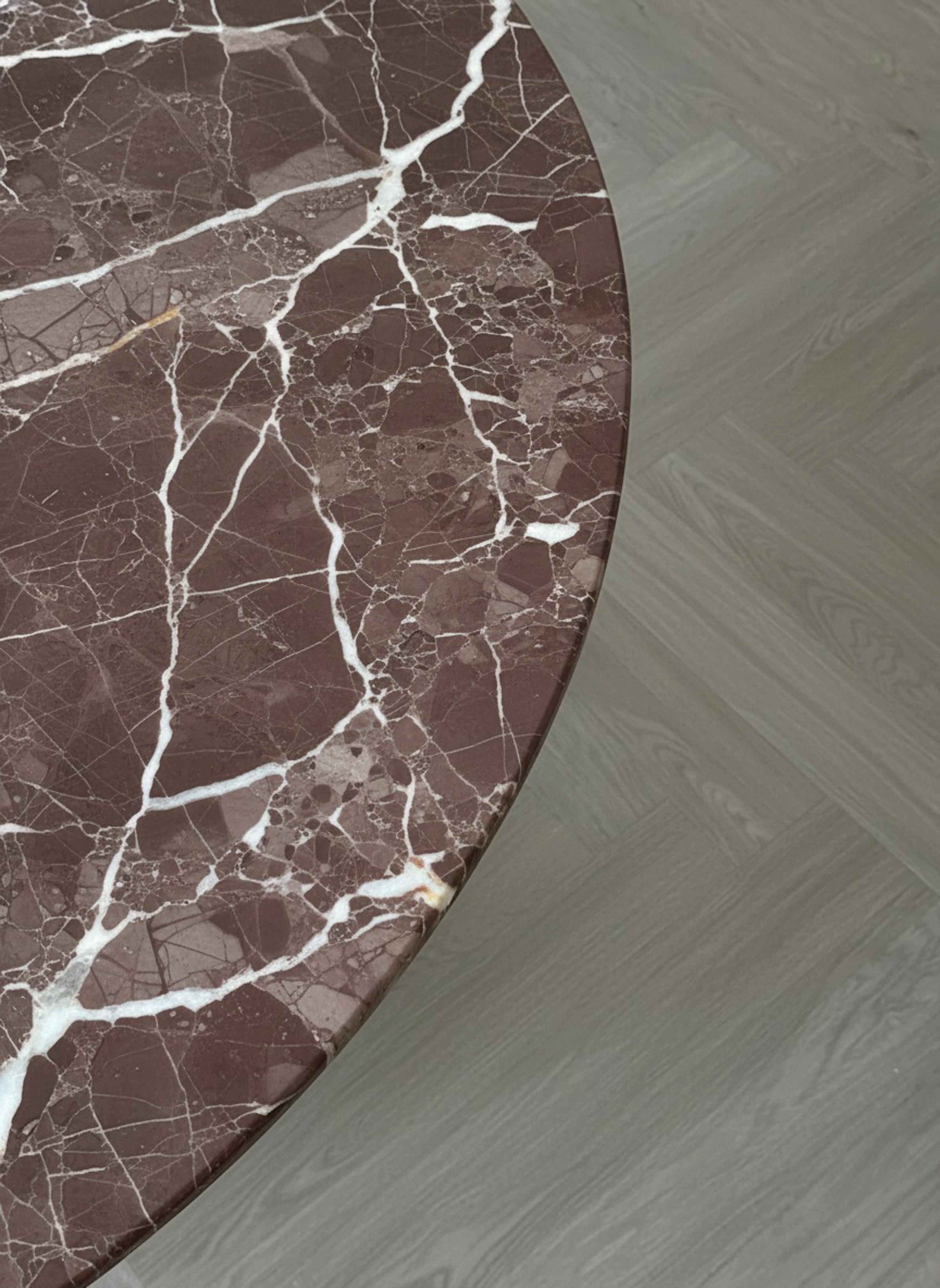https://a.1stdibscdn.com/italian-rosso-levanto-marble-round-table-handcrafted-sculptural-dining-table-for-sale-picture-2/f_91932/f_471800021761295232843/WhatsApp_Image_2025_10_23_at_15_19_11_master.jpeg