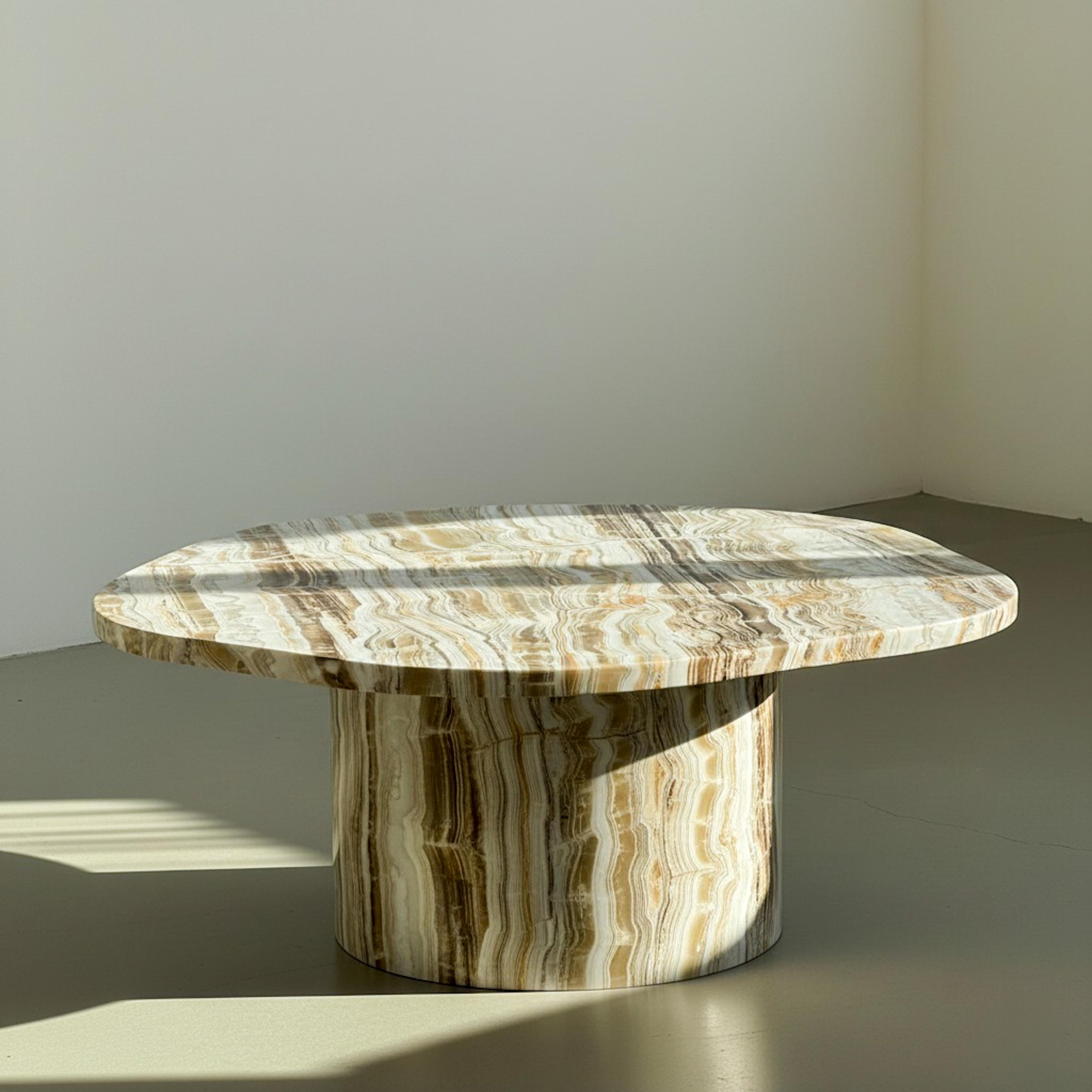 https://a.1stdibscdn.com/sculptural-solid-onyx-coffee-table-contemporary-italian-design-marble-table-for-sale-picture-2/f_91932/f_472819521761823427394/WhatsApp_Image_2025_10_30_at_09_38_56_2__master.jpeg