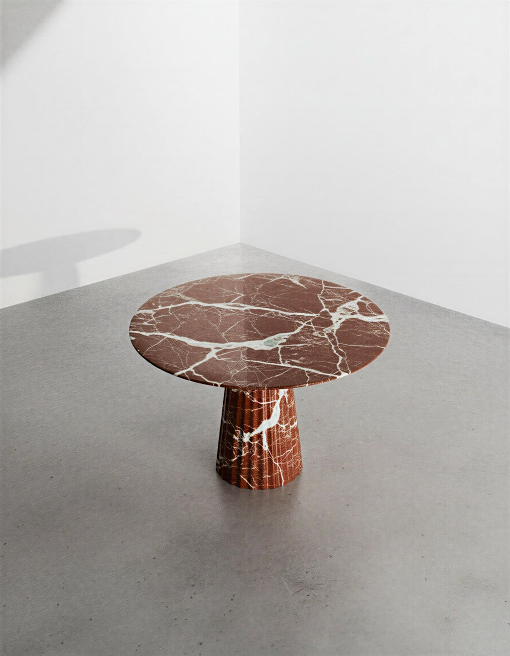 https://a.1stdibscdn.com/monolithic-round-rosso-levanto-marble-dining-table-an-italian-modern-centerpiece-for-sale-picture-2/f_91932/f_474647821762783066475/WhatsApp_Image_2025_11_10_at_14_53_01_master.jpeg