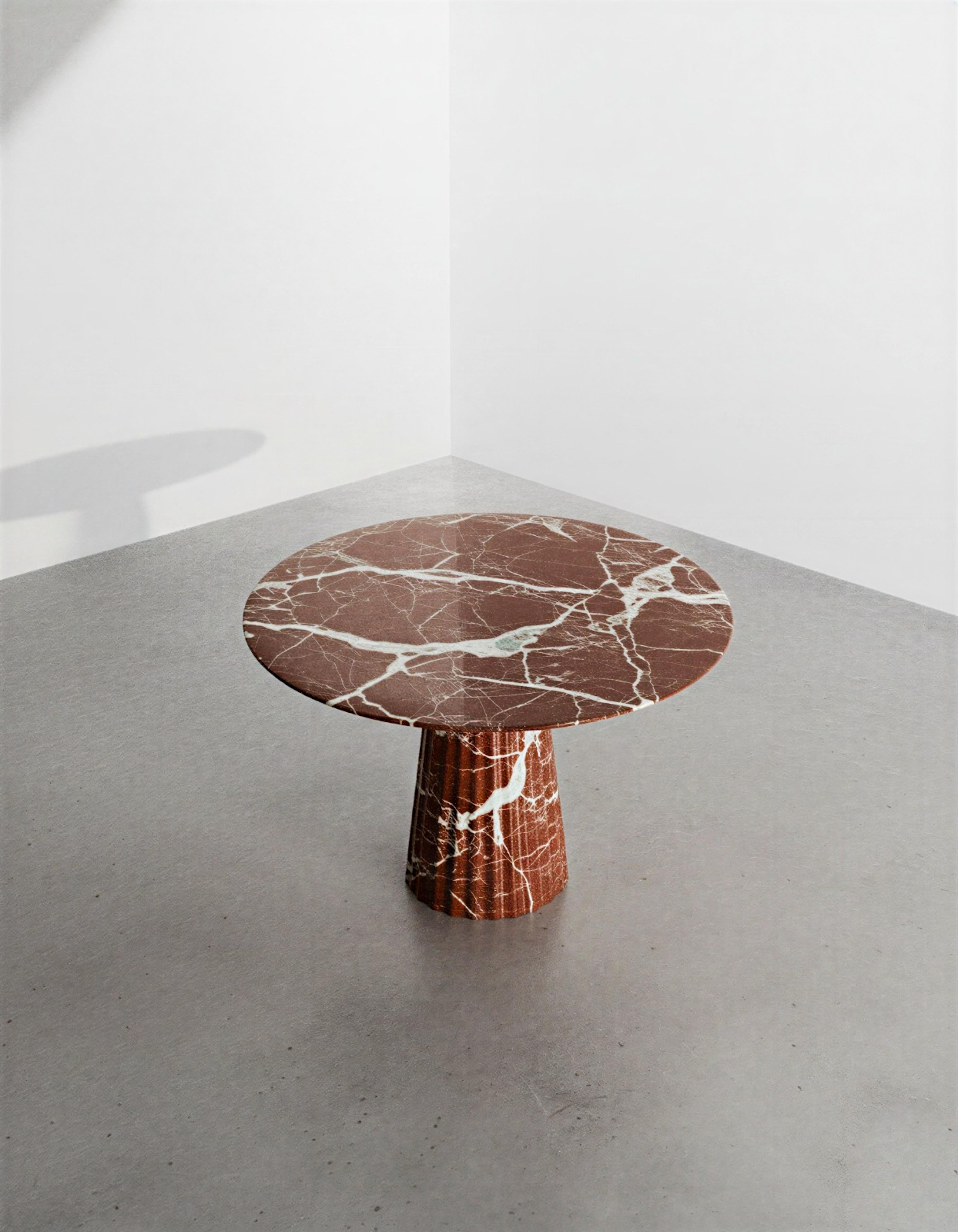 https://a.1stdibscdn.com/monolithic-round-rosso-levanto-marble-dining-table-an-italian-modern-centerpiece-for-sale-picture-2/f_91932/f_474647821762783066475/WhatsApp_Image_2025_11_10_at_14_53_01_master.jpeg