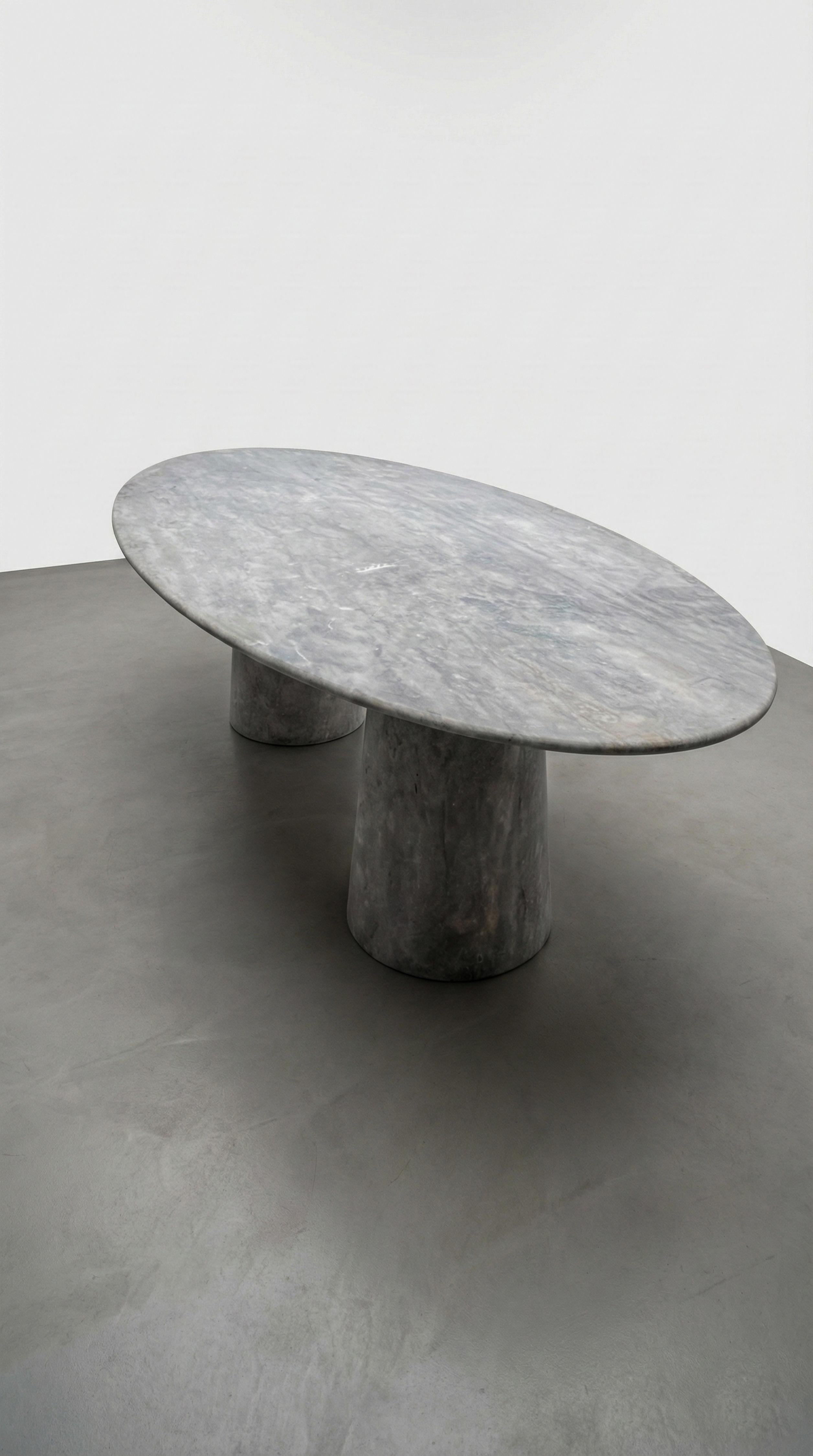 https://a.1stdibscdn.com/ellips-silver-travertine-stone-dining-table-silver-marble-oval-table-for-sale-picture-7/f_91932/f_477193621764163697067/WhatsApp_Image_2025_11_26_at_16_25_16_master.jpeg
