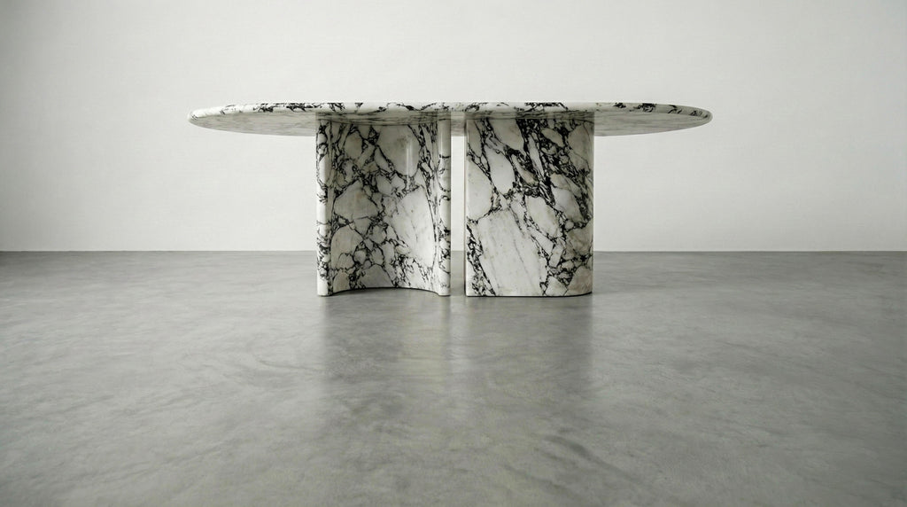 https://a.1stdibscdn.com/calacatta-viola-marble-dining-table-with-sculptural-stone-base-monolith-table-for-sale-picture-2/f_91932/f_478481721764923994254/WhatsApp_Image_2025_12_05_at_10_55_59_1__master.jpeg