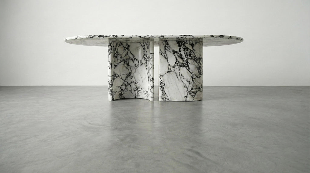 https://a.1stdibscdn.com/calacatta-viola-marble-dining-table-with-sculptural-stone-base-monolith-table-for-sale-picture-3/f_91932/f_478481721764923994116/WhatsApp_Image_2025_12_05_at_10_55_59_master.jpeg