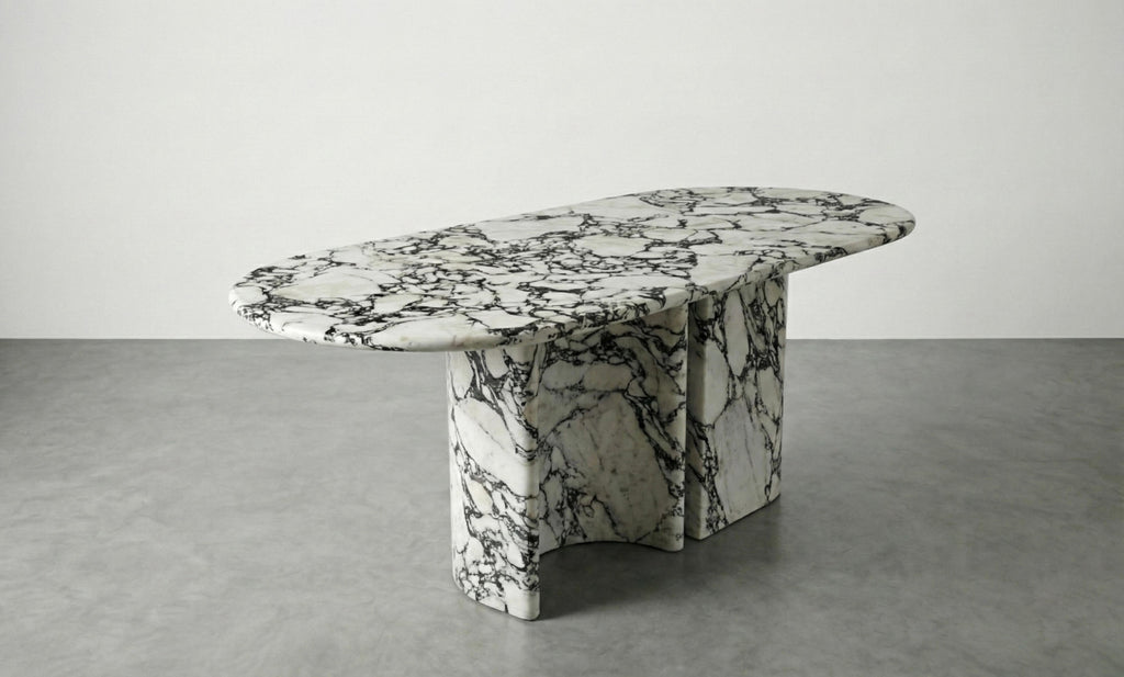 https://a.1stdibscdn.com/calacatta-viola-marble-dining-table-with-sculptural-stone-base-monolith-table-for-sale-picture-4/f_91932/f_478481721764923994270/WhatsApp_Image_2025_12_05_at_10_56_00_1__master.jpeg
