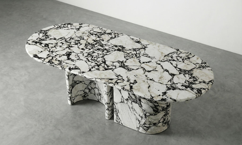 https://a.1stdibscdn.com/calacatta-viola-marble-dining-table-with-sculptural-stone-base-monolith-table-for-sale-picture-5/f_91932/f_478481721764923994586/WhatsApp_Image_2025_12_05_at_10_56_00_2__master.jpeg