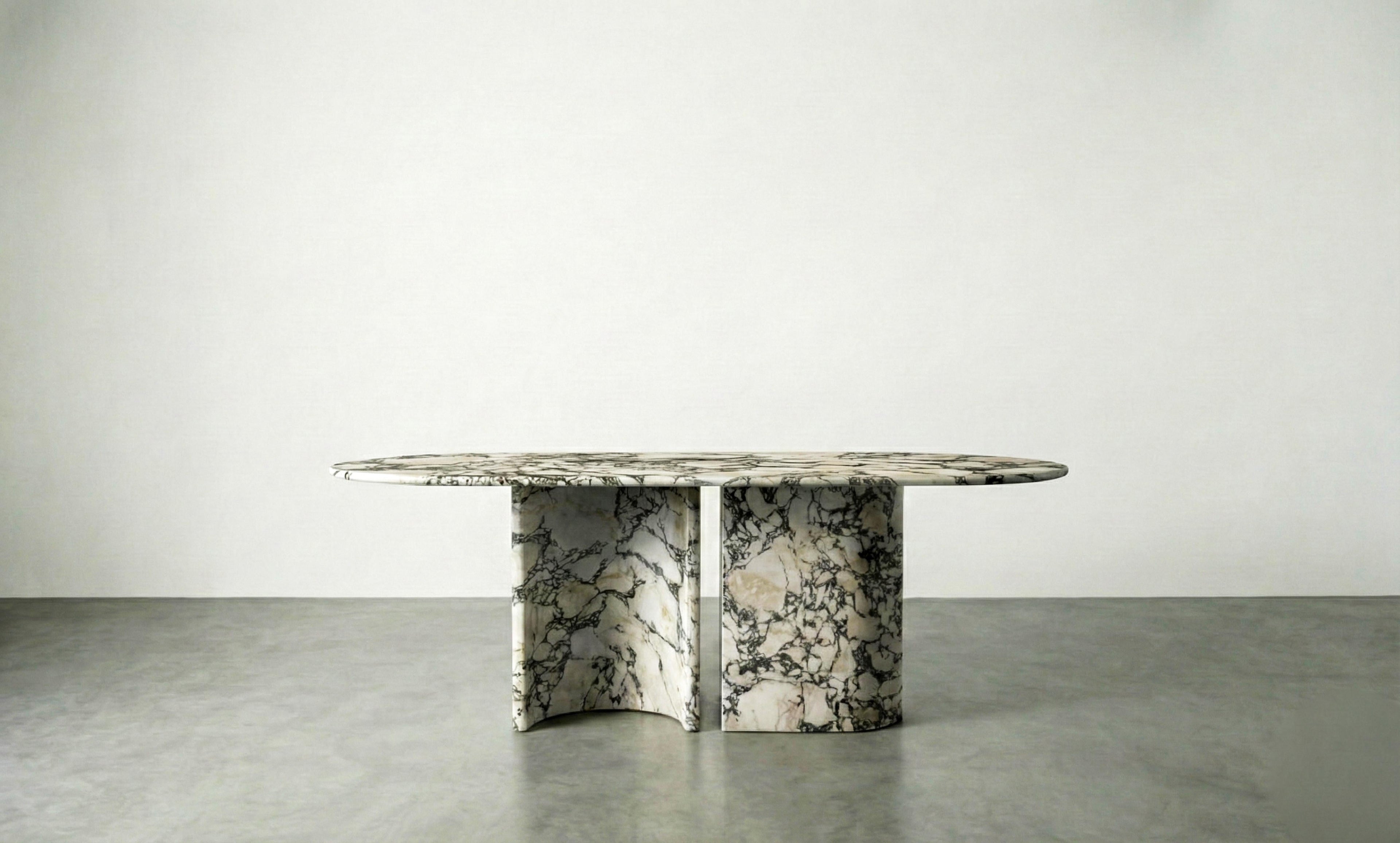 https://a.1stdibscdn.com/calacatta-viola-marble-dining-table-with-sculptural-stone-base-monolith-table-for-sale-picture-6/f_91932/f_478481721764923994206/WhatsApp_Image_2025_12_05_at_10_56_00_3__master.jpeg
