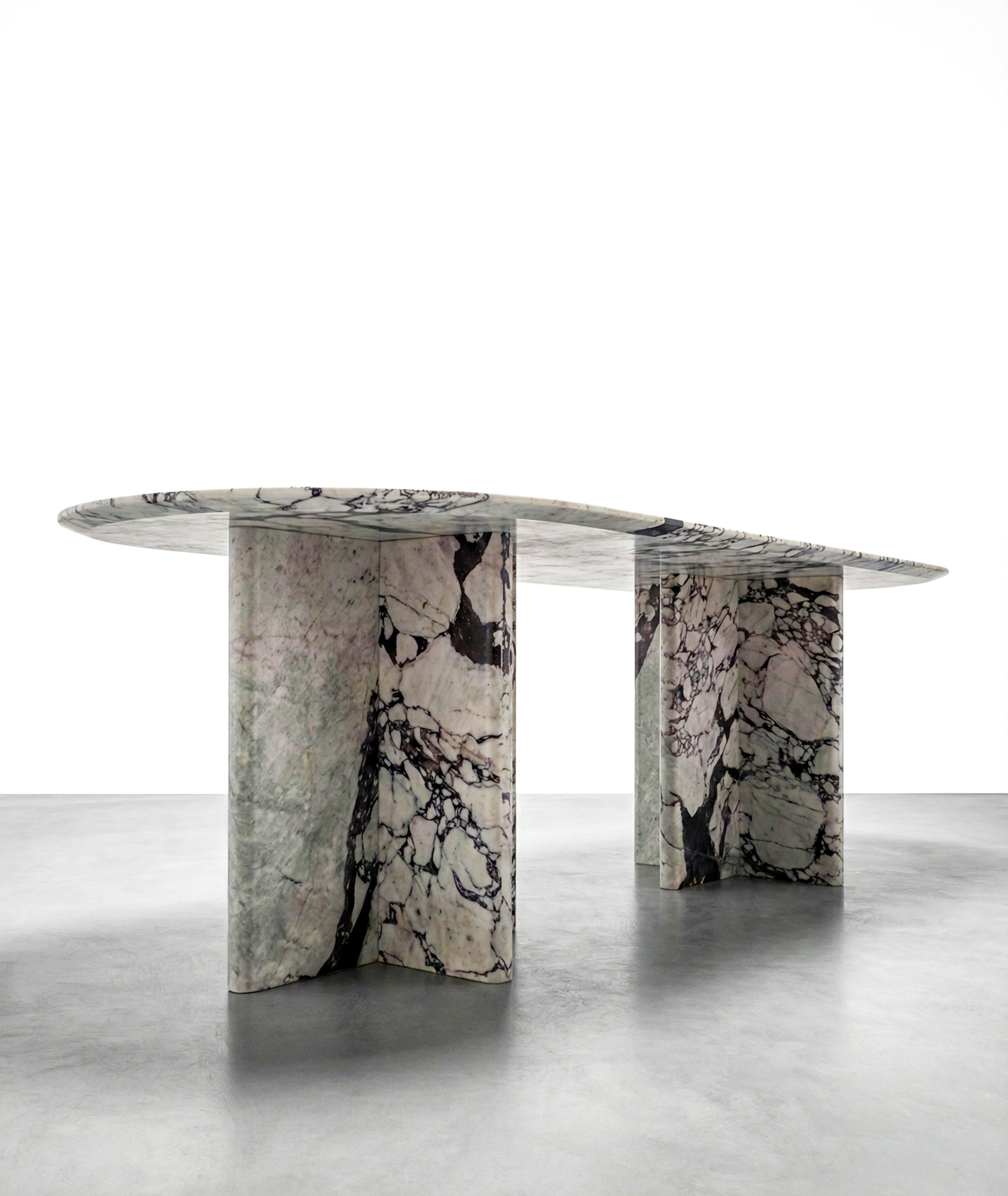 https://a.1stdibscdn.com/calacatta-viola-marble-monolith-dining-table-custom-made-white-marble-table-for-sale-picture-2/f_91932/f_479481121765438065313/WhatsApp_Image_2025_12_11_at_09_59_55_1__master.jpeg