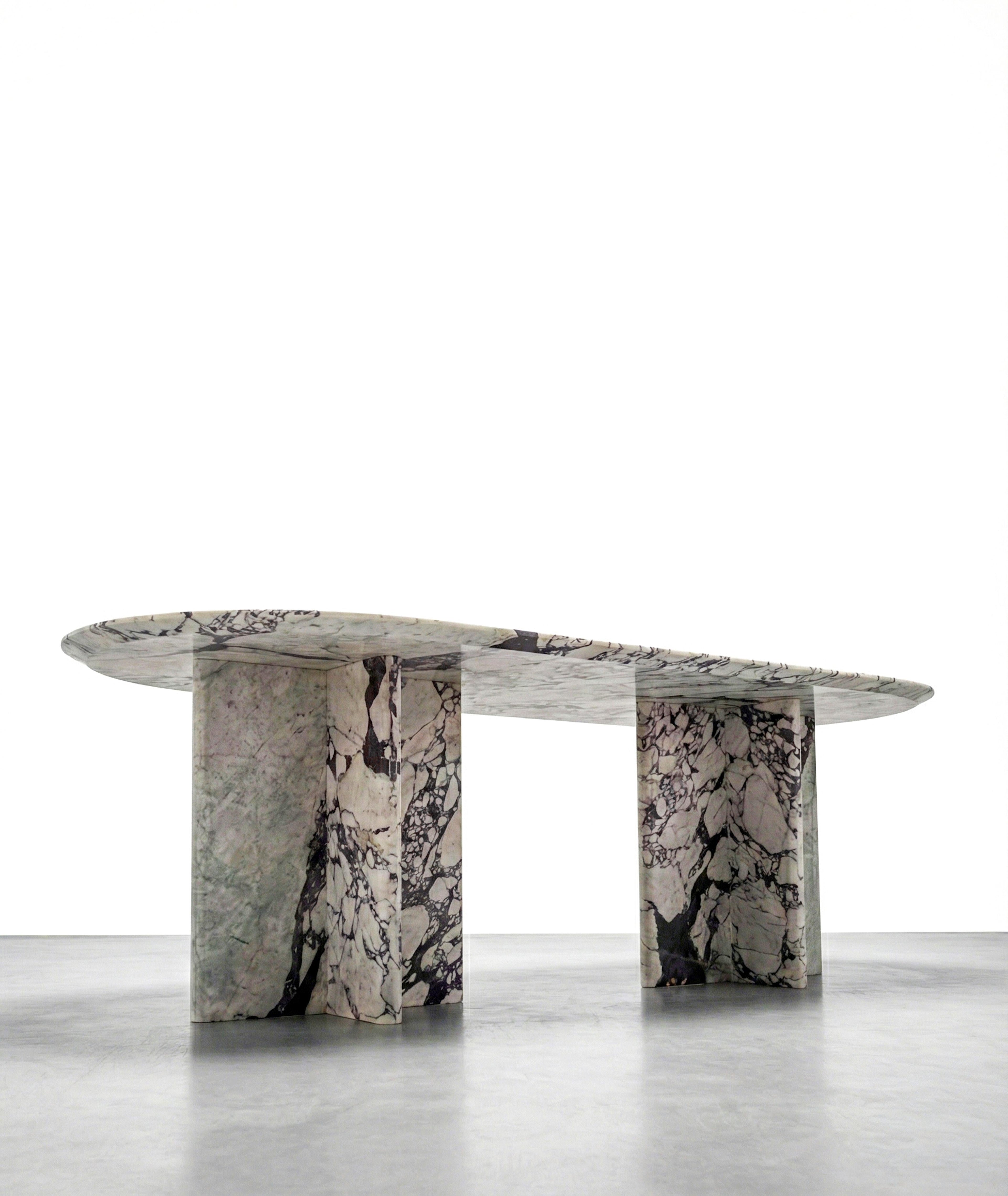 https://a.1stdibscdn.com/calacatta-viola-marble-monolith-dining-table-custom-made-white-marble-table-for-sale-picture-3/f_91932/f_479481121765438066252/WhatsApp_Image_2025_12_11_at_09_59_55_master.jpeg
