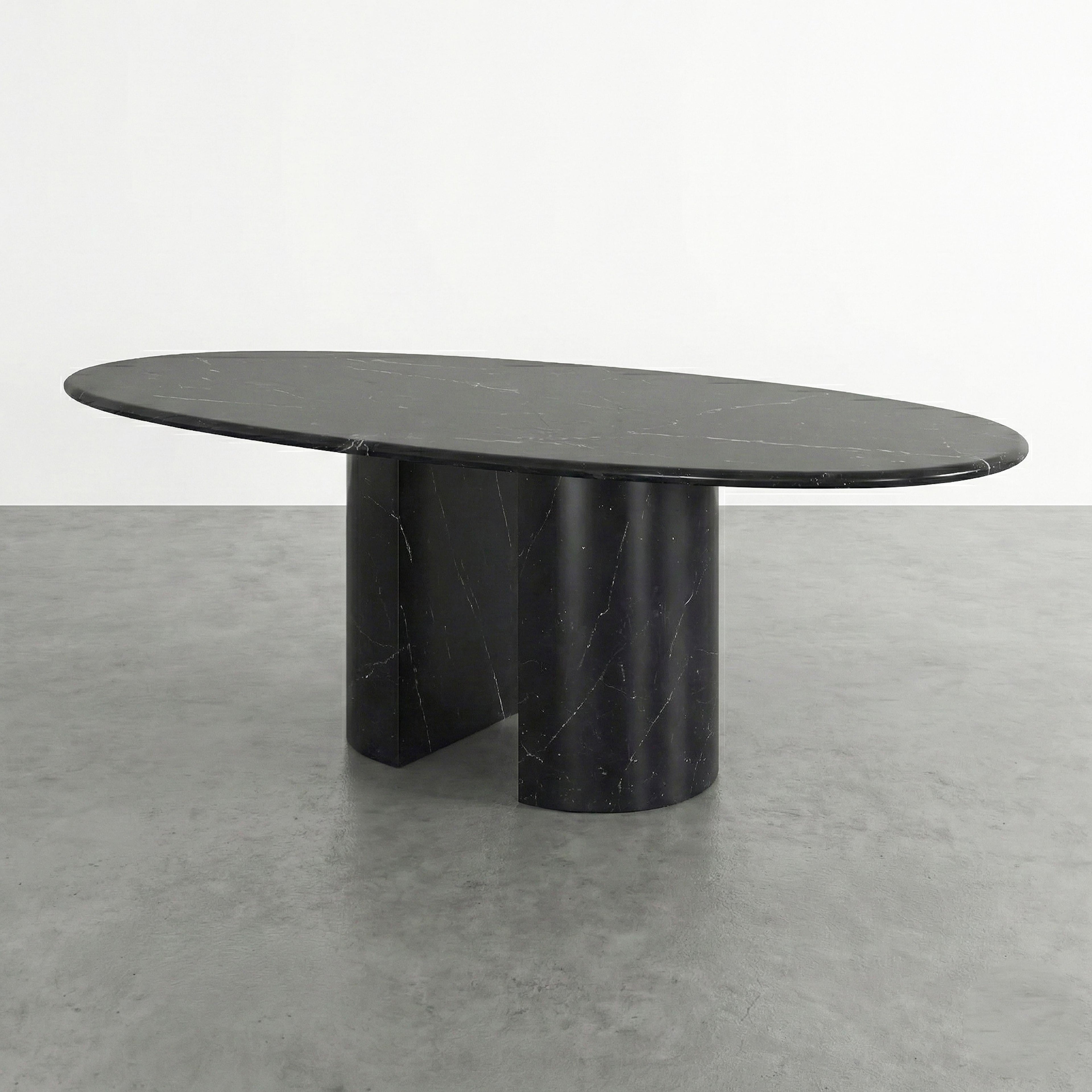 https://a.1stdibscdn.com/alexander-black-marble-dining-table-oval-customizable-marble-table-for-sale-picture-2/f_91932/f_483337221768470409927/WhatsApp_Image_2026_01_15_at_11_38_05_master.jpeg