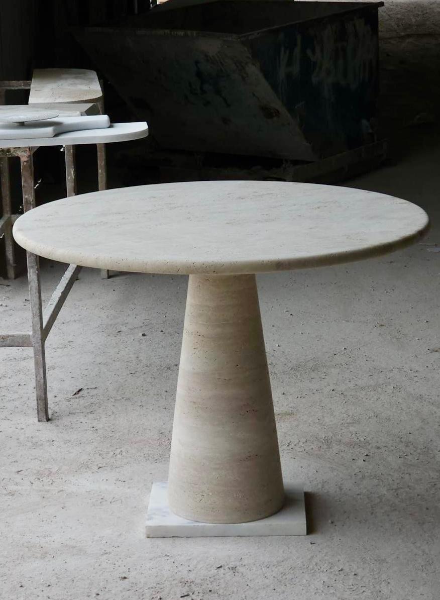 https://a.1stdibscdn.com/cream-travertine-round-dining-table-in-the-style-of-1970-angelo-mangiarotti-for-sale-picture-4/f_80522/f_491511521773094969690/WhatsApp_Image_2026_02_25_at_11_02_24_master.jpg