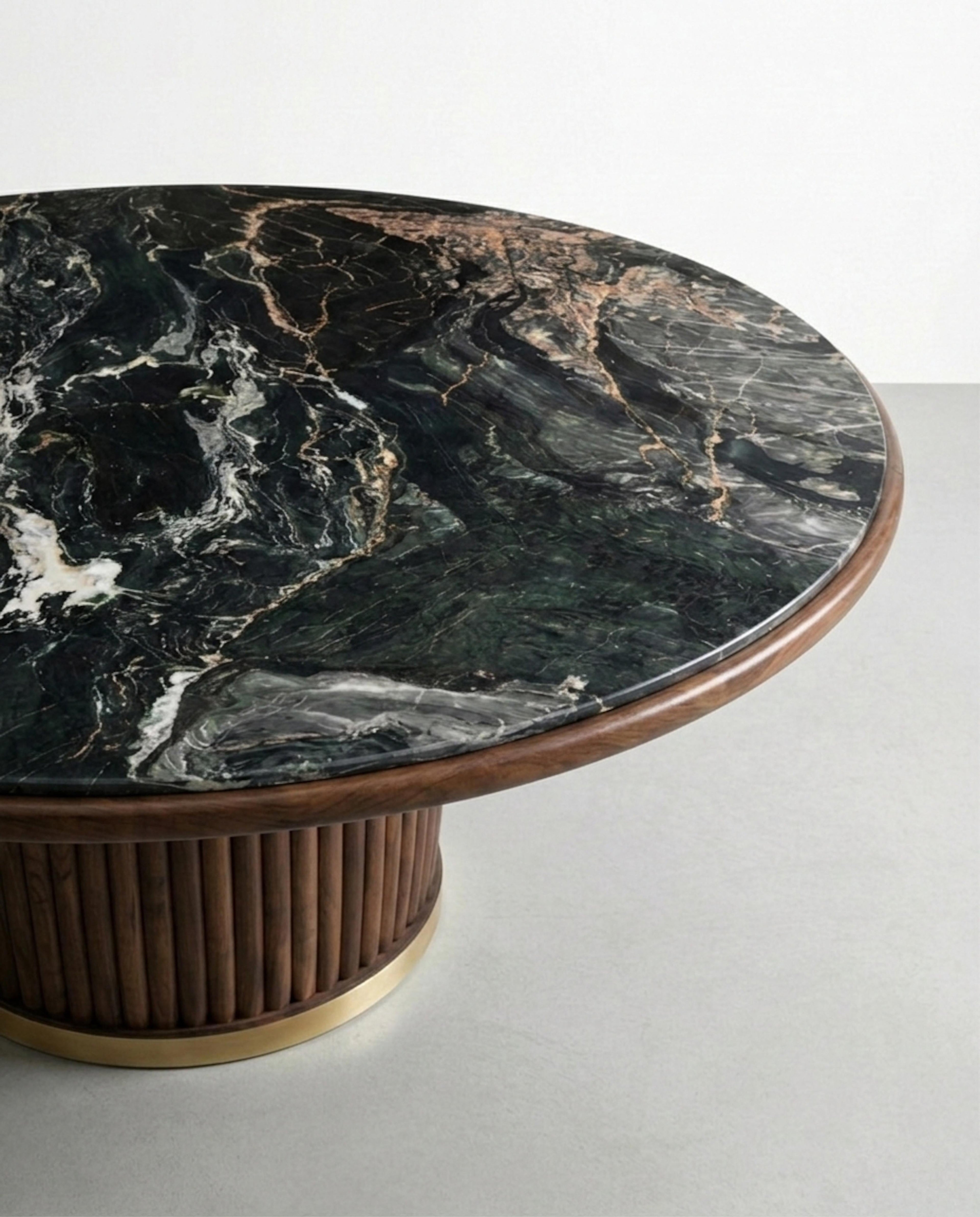 https://a.1stdibscdn.com/nero-picasso-marble-round-dining-table-with-custom-walnut-base-for-sale-picture-2/f_91932/f_490042221772191778901/WhatsApp_Image_2026_02_27_at_14_16_33_master.jpeg