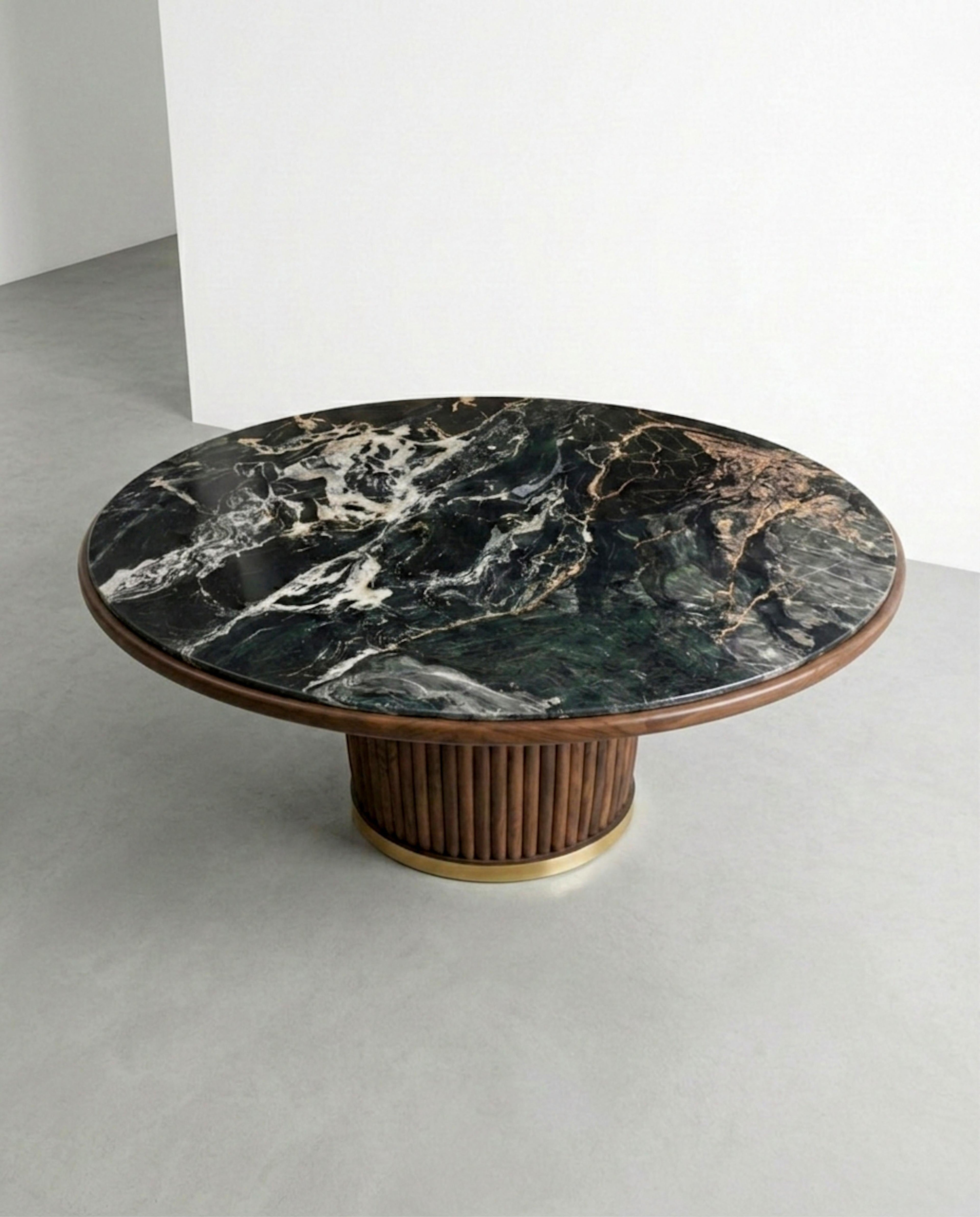 https://a.1stdibscdn.com/nero-picasso-marble-round-dining-table-with-custom-walnut-base-for-sale-picture-3/f_91932/f_490042221772191778115/WhatsApp_Image_2026_02_27_at_14_16_34_3__master.jpeg