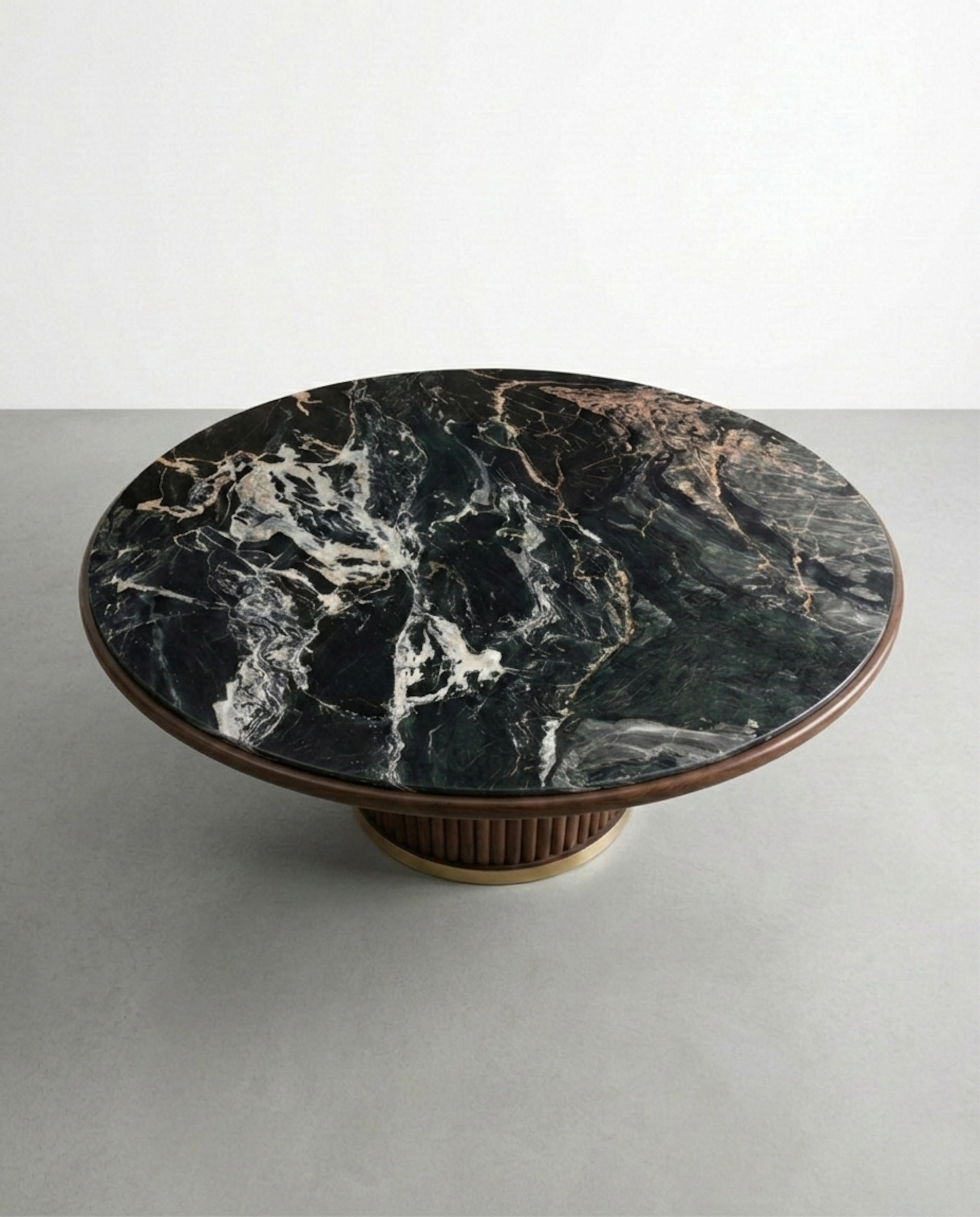 https://a.1stdibscdn.com/nero-picasso-marble-round-dining-table-with-custom-walnut-base-for-sale-picture-6/f_91932/f_490042221772191778411/WhatsApp_Image_2026_02_27_at_14_16_34_master.jpeg