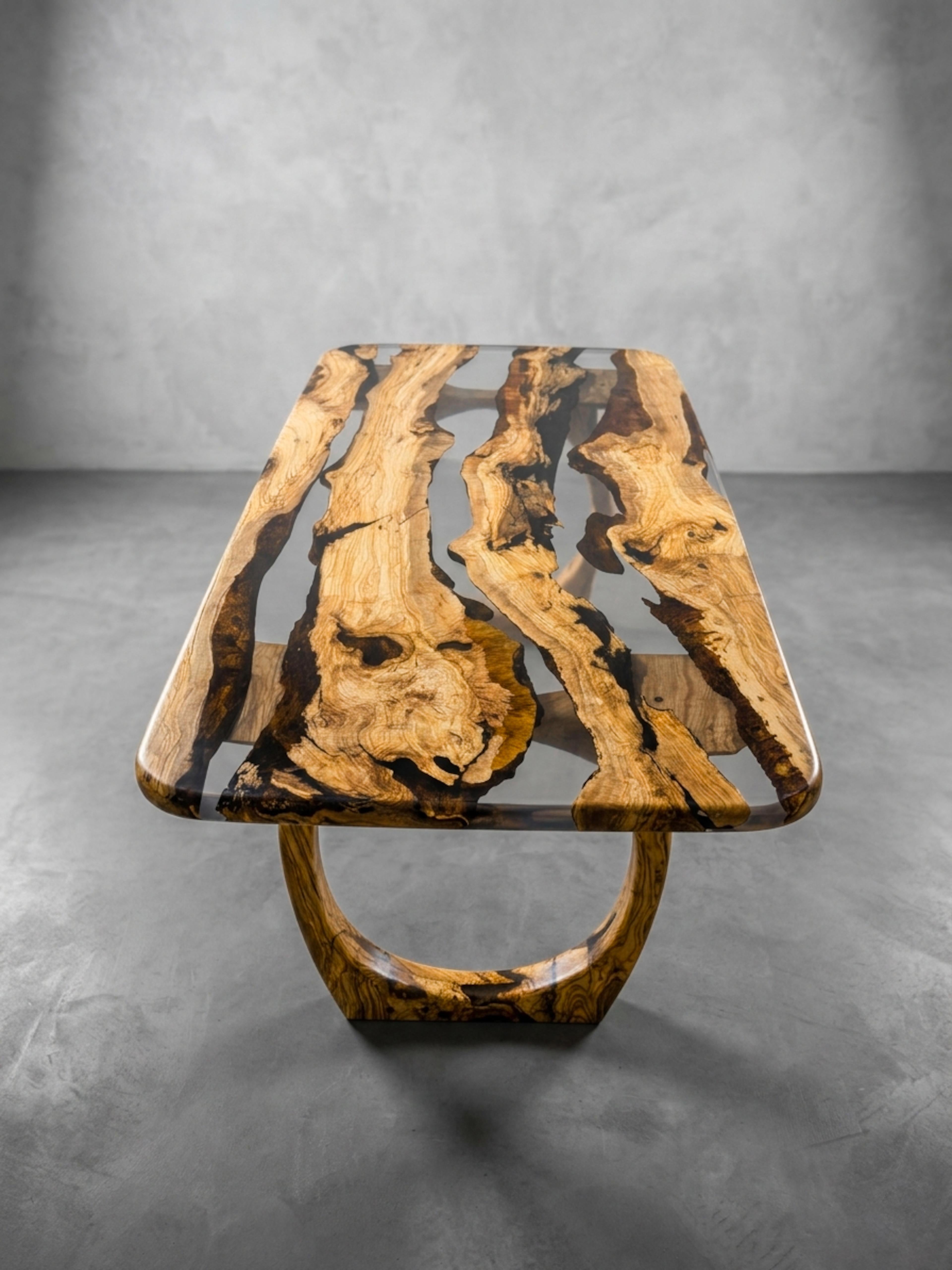 https://a.1stdibscdn.com/olive-wood-dining-table-with-clear-epoxy-resin-custom-design-seats-8-10-for-sale-picture-7/f_91932/f_490972021772796632091/WhatsApp_Image_2026_03_05_at_23_56_08_2__master.jpeg