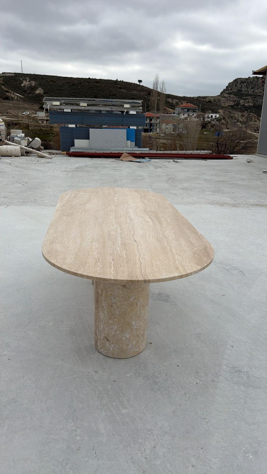 https://a.1stdibscdn.com/oval-beige-handmade-travertine-stone-dining-table-natural-marble-kitchen-table-for-sale-picture-3/f_91932/f_492887321773912918173/WhatsApp_Image_2026_03_18_at_15_48_36_1_Kopya_master.jpeg