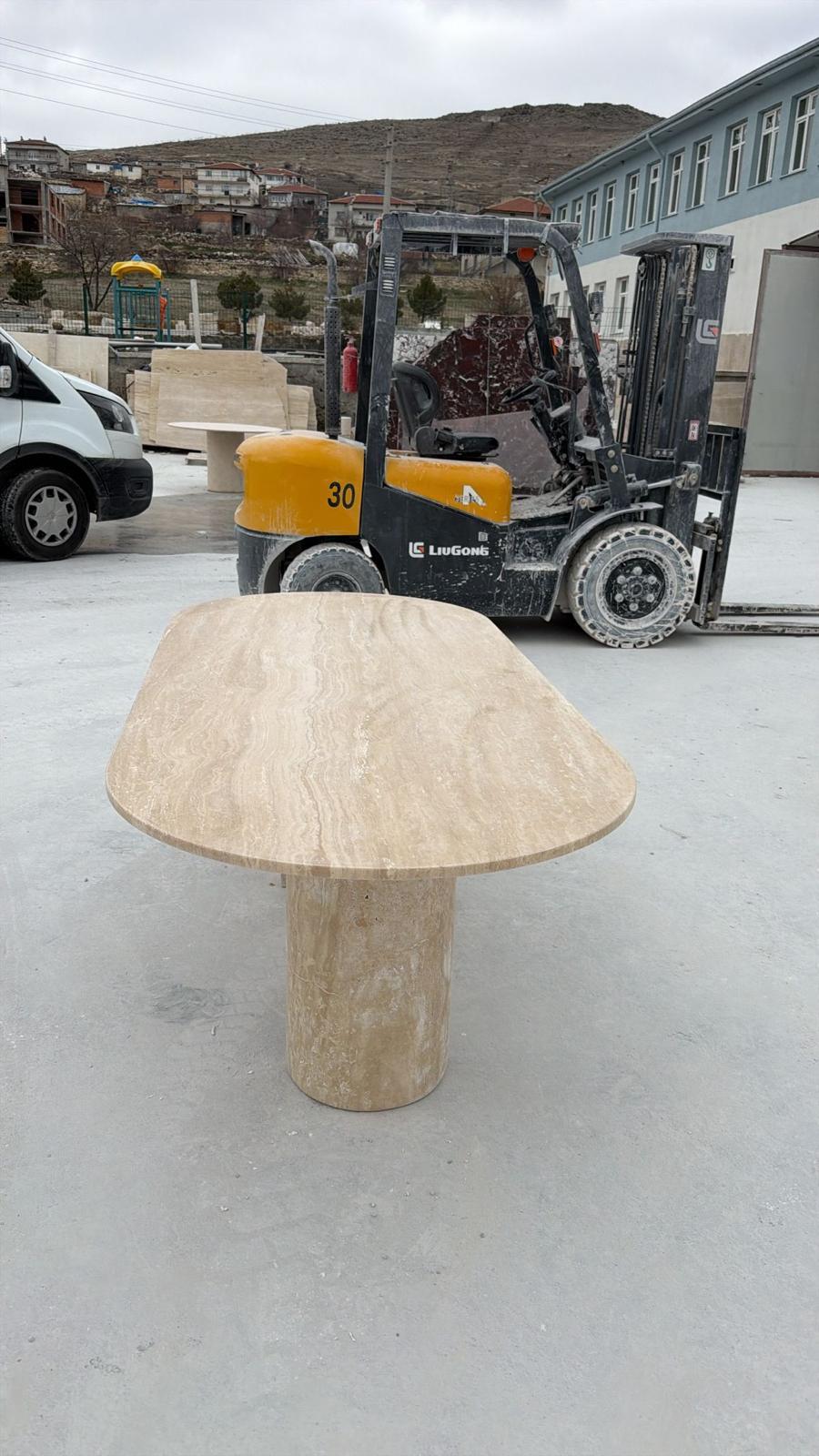 https://a.1stdibscdn.com/oval-beige-handmade-travertine-stone-dining-table-natural-marble-kitchen-table-for-sale-picture-4/f_91932/f_492887321773912918362/WhatsApp_Image_2026_03_18_at_15_48_36_2_Kopya_master.jpeg
