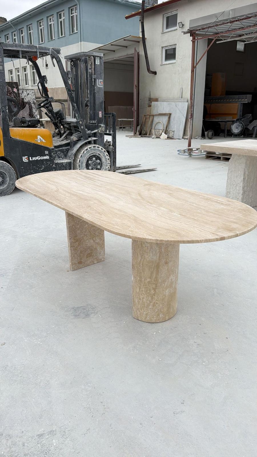 https://a.1stdibscdn.com/oval-beige-handmade-travertine-stone-dining-table-natural-marble-kitchen-table-for-sale-picture-5/f_91932/f_492887321773912918379/WhatsApp_Image_2026_03_18_at_15_48_36_3_Kopya_master.jpeg