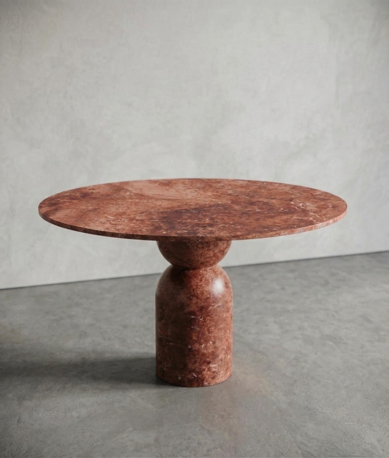 https://a.1stdibscdn.com/red-travertine-stone-round-dining-table-custom-marble-circle-table-for-sale-picture-8/f_91932/f_493796021774507005189/WhatsApp_Image_2026_03_26_at_09_28_57_2__master.jpeg