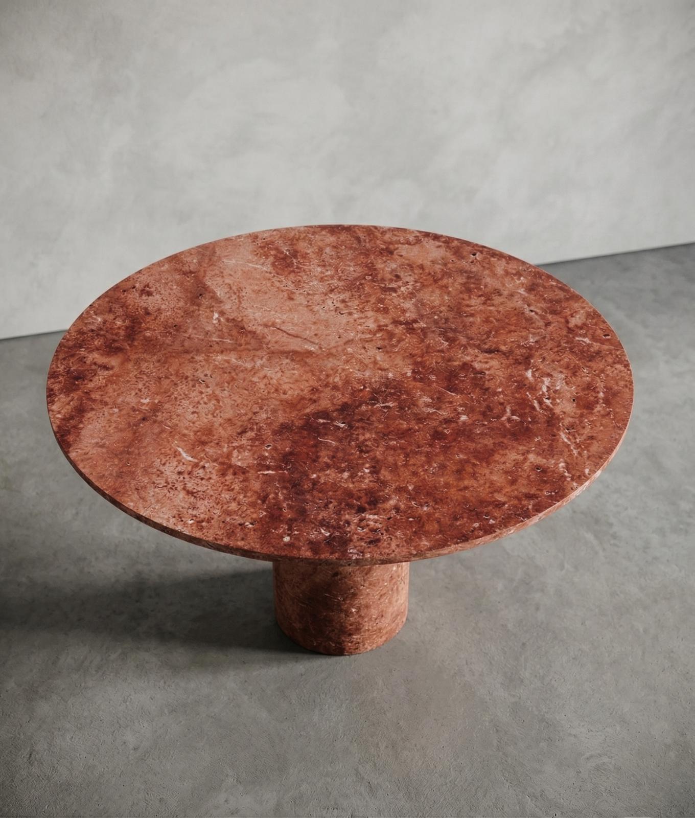 https://a.1stdibscdn.com/red-travertine-stone-round-dining-table-custom-marble-circle-table-for-sale-picture-3/f_91932/f_493796021774507005528/WhatsApp_Image_2026_03_26_at_09_28_57_3__master.jpeg