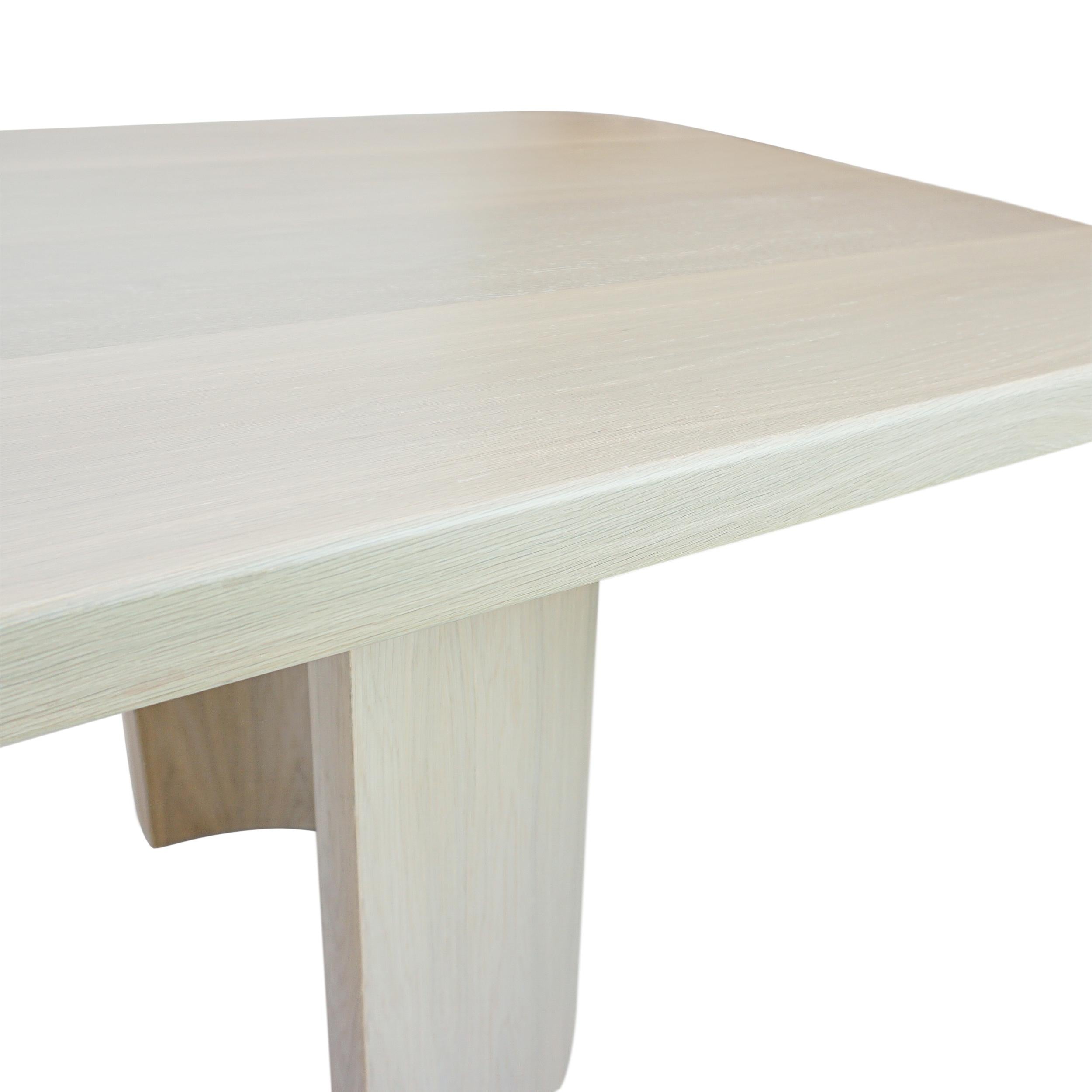 https://a.1stdibscdn.com/modern-rectangular-white-oak-dining-table-w-half-cylinder-legs-round-corners-for-sale-picture-12/f_21233/f_335760421680209516543/White_Oak_Half_Moon_Dining_Table_Angle_Edge_Detail_master.jpg